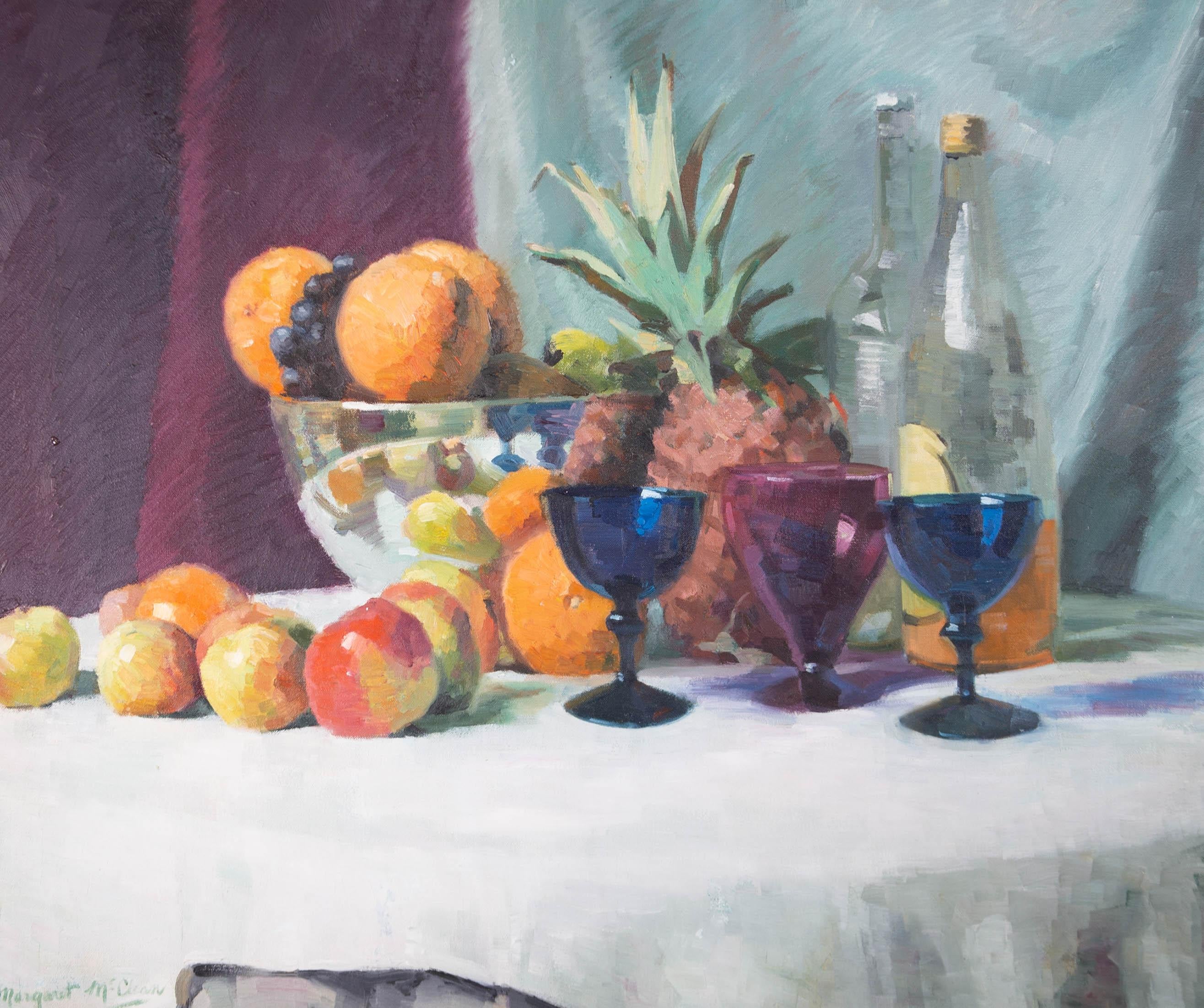 A wonderful still life study of fruit on a table with various coloured glassware. Well presented in a gilt effect frame. Signed. On canvas on stretchers.

