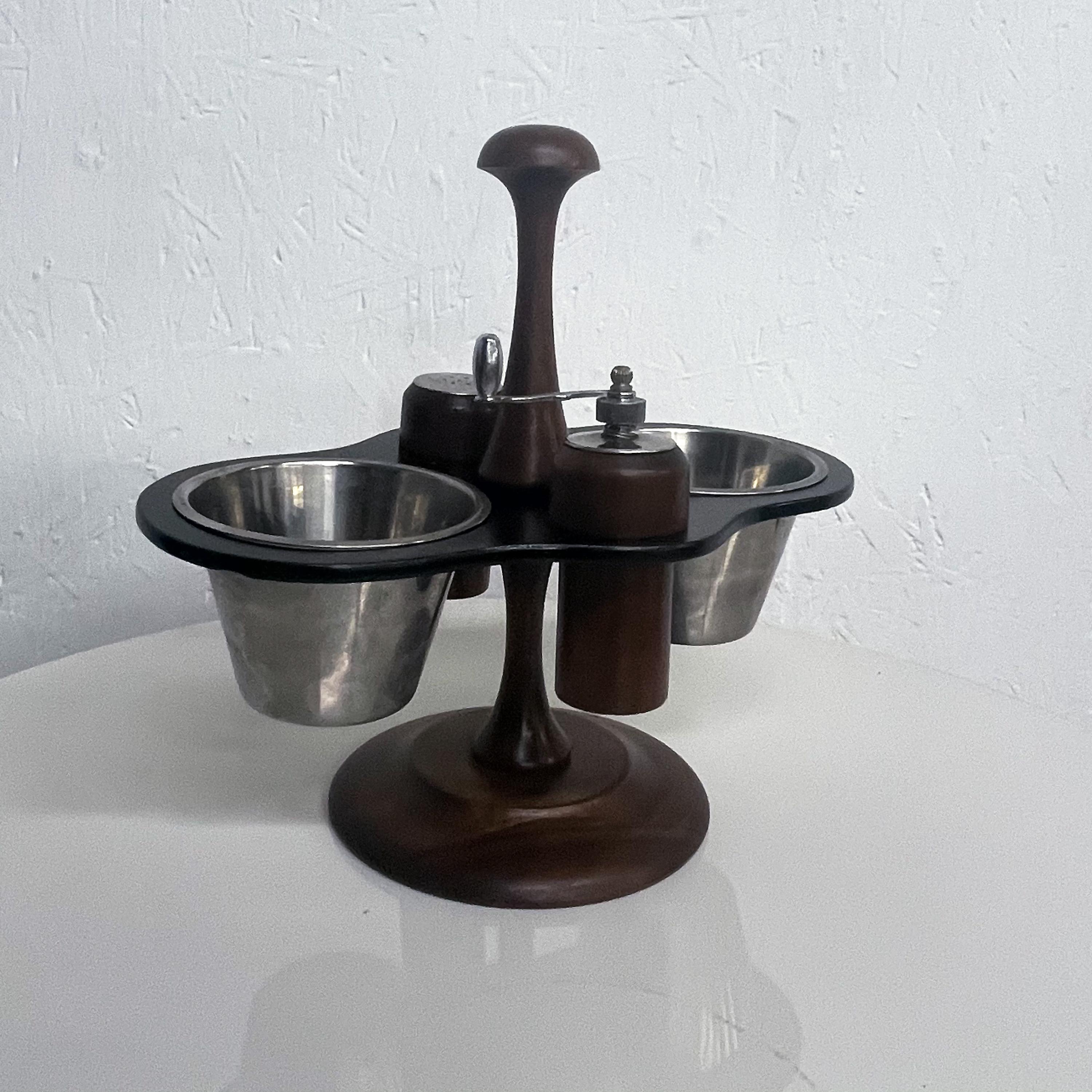 By Margaret Studios Norway Condiment Caddy Carousel swivel with salt pepper shakers and 2 small Condiment bowls Mid-Century Modern Collectible
Measures: 11.25 T x 10.25 x 7 W
Made in Norway, Lazy Susan swivel service set for dining table
