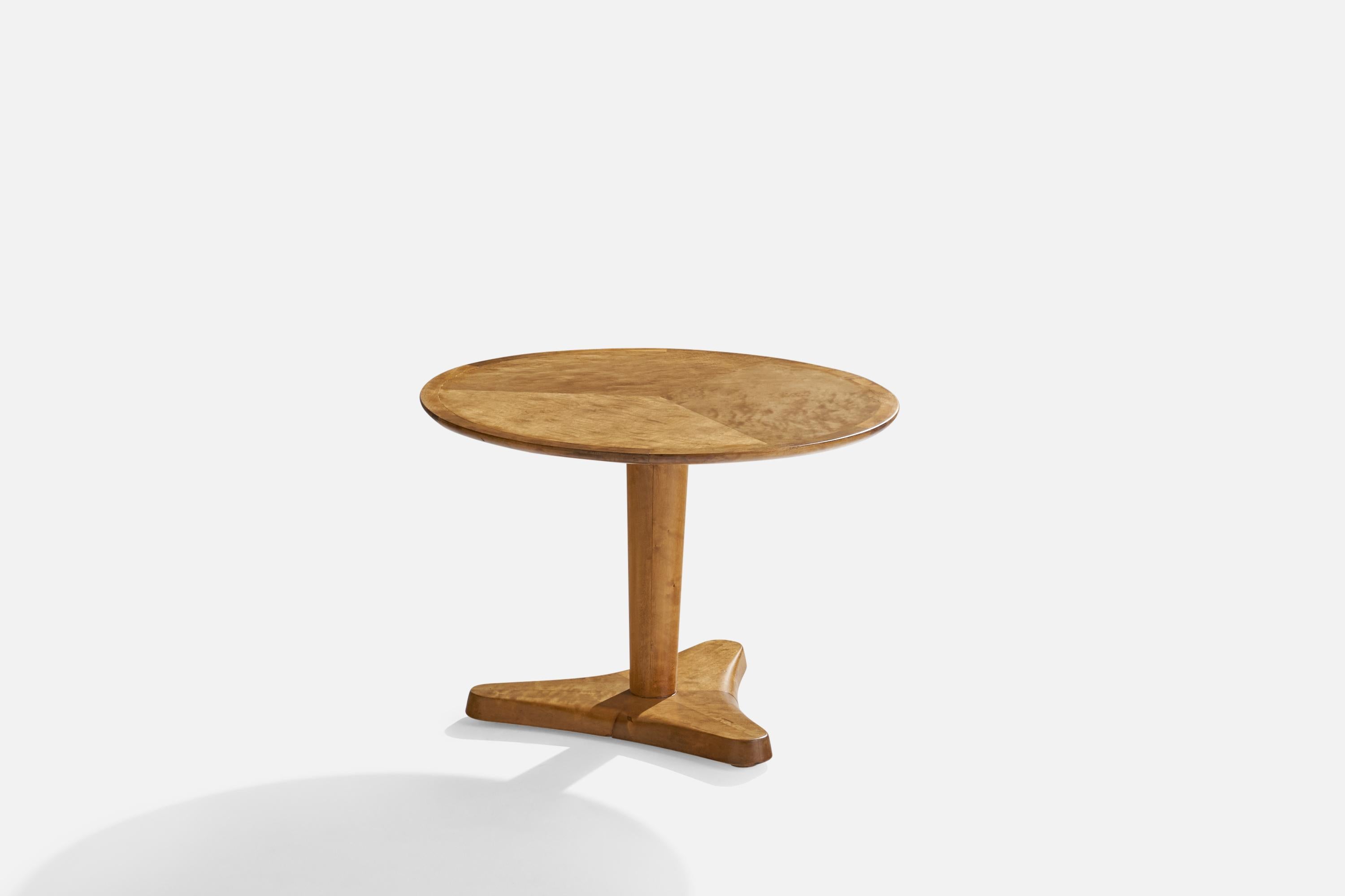 A birch side table designed by Margaret T. Nordman and produced by Oy Stockmann Ab, Keravan Puusepäntehdas, Finland, Finland, 1930s.