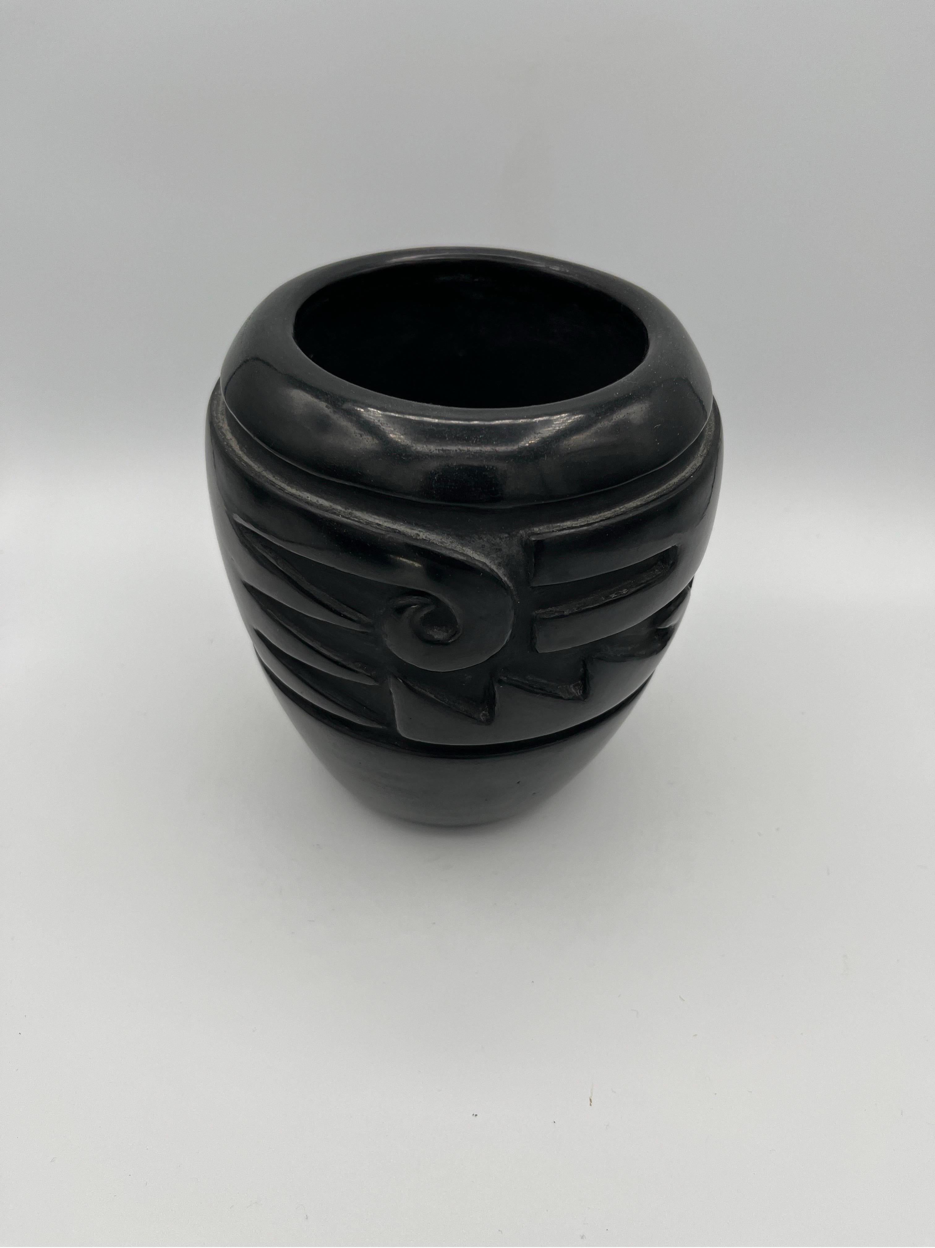 A beautiful earthenware vessel by Margaret Tafoya (1904-2001), a renowned master potter from the Santa Clara Pueblo. Margaret Tafoya's work is revered by collectors of Native American art.
