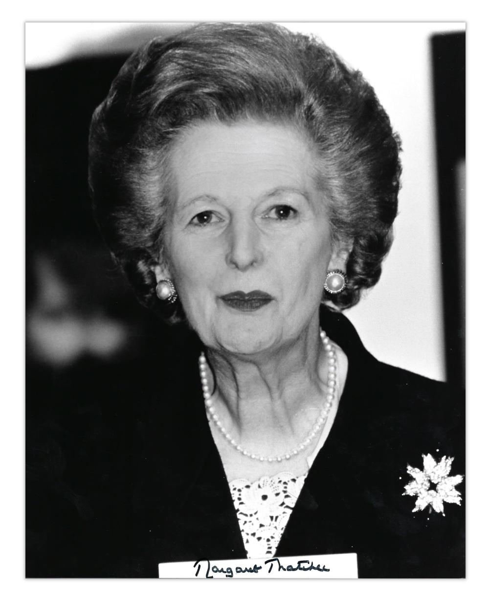 A signed black and white photograph of British prime minister Margaret Thatcher 
Margaret Thatcher (1925 - 2013) was the UK's first female prime minister. She served three consecutive terms in office, 1979-1990, and received the nickname 