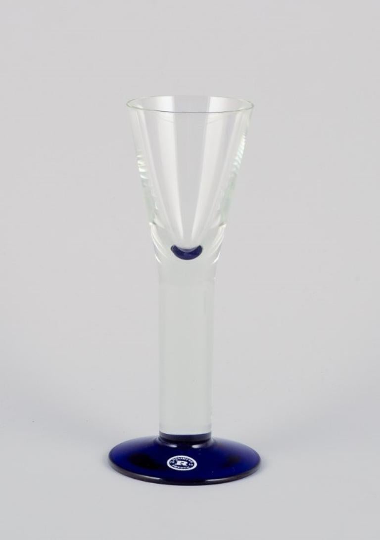 Margareta Hennix for Reijmyre, Sweden. A set of four schnapps glasses. Handmade and mouth-blown art glass in blue, yellow, and clear glass.
Approximately from the 1990s.
Signed and labeled.
In perfect condition.
Dimensions: H 20.0 cm x D 6.5 cm.