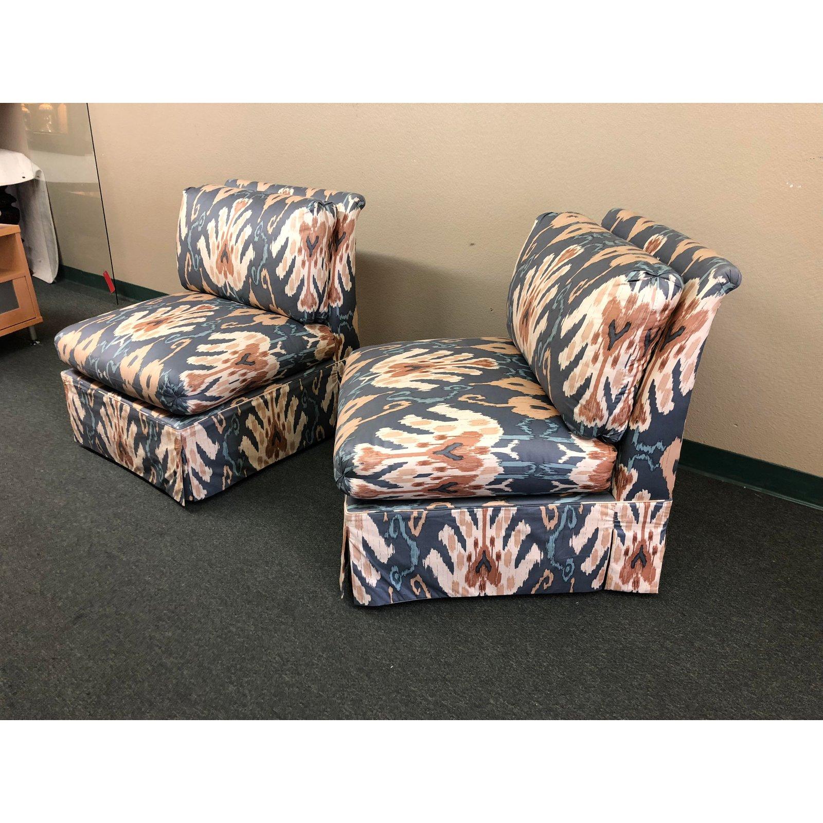 A pair of chintz upholstered chairs from Marge Carson, Rosemead CA. The chairs offer all the design, quality construction, attention to detail and upgraded fabric (Darjeeling Blue) one comes to expect from the company. Decor pillows are included.