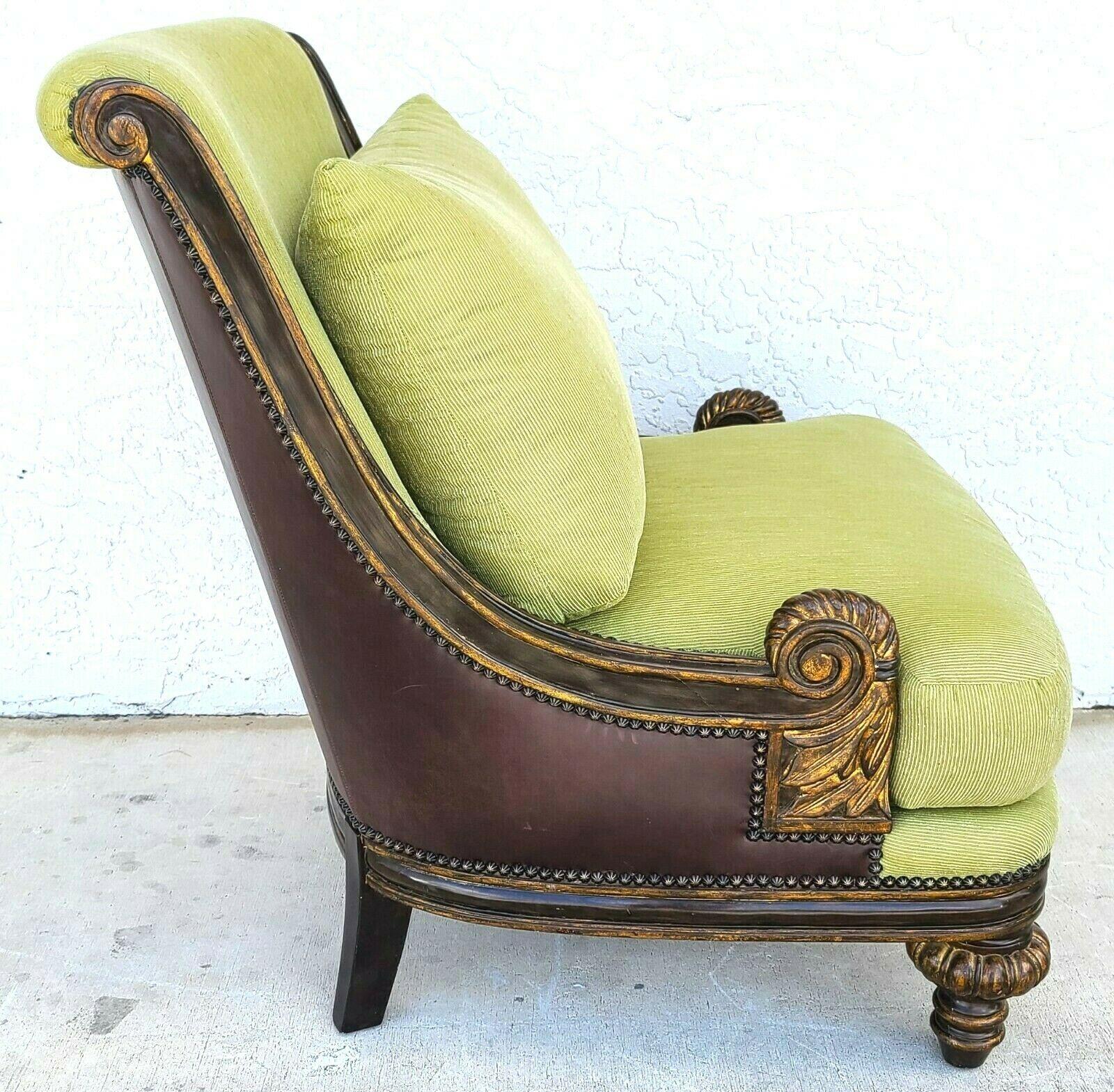 Marge Carson Huntington Manor lounge chairs Model HT49
Impressively scaled with Leatherback, distressed wood finish highlighted with subtle gilt accents, and French nail trim.

Approximate Measurements in Inches
41