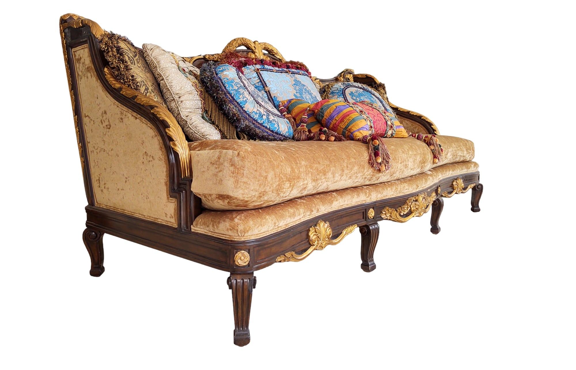 Large-scale Italianate sofa by Marge Carson, upholstered in velvet. Custom-made pillows are included, as shown, except for the front center pillow, which is not included.
Since its inception in 1947, Marge Carson has been making furniture for the