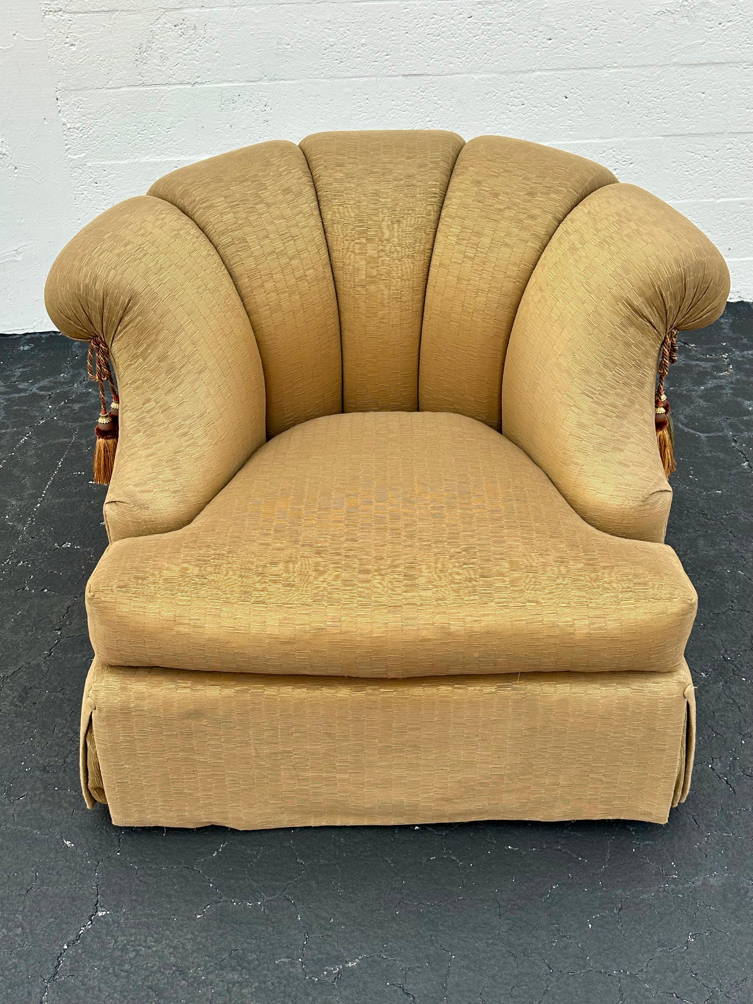 Transport yourself back to the sleek and sophisticated early 2000s with this exquisite sculptural large swivel chairs on a wood base. The ultra rare barrel tub style swivel chairs exudes an air of luxury and refinement. Outstanding design is
