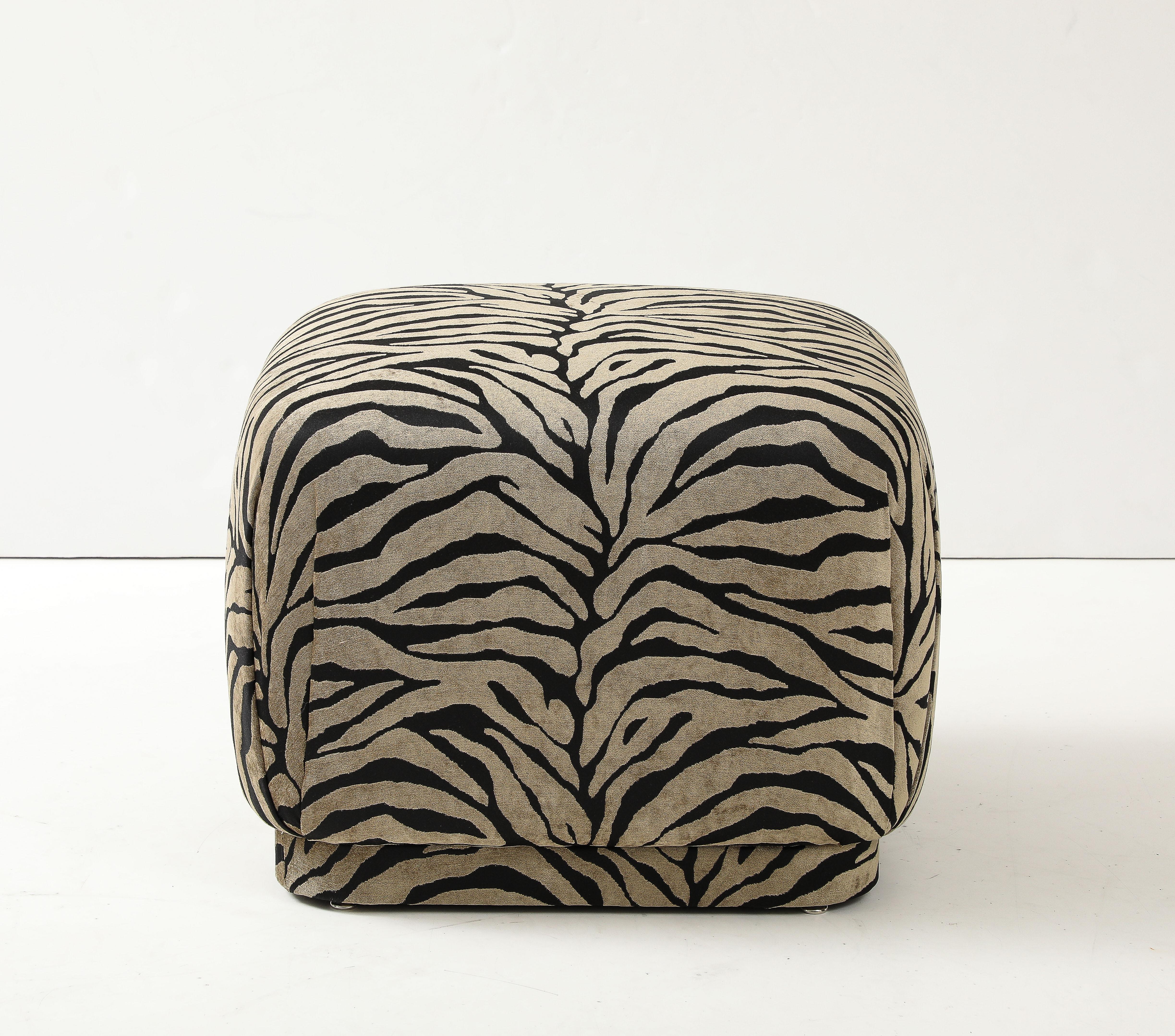 Modernist Marge Carson upholstered ottoman/ pouf in Scalamandre cut velvet tiger fabric. A great addition to any traditional or modern setting where an extra seat is needed.
