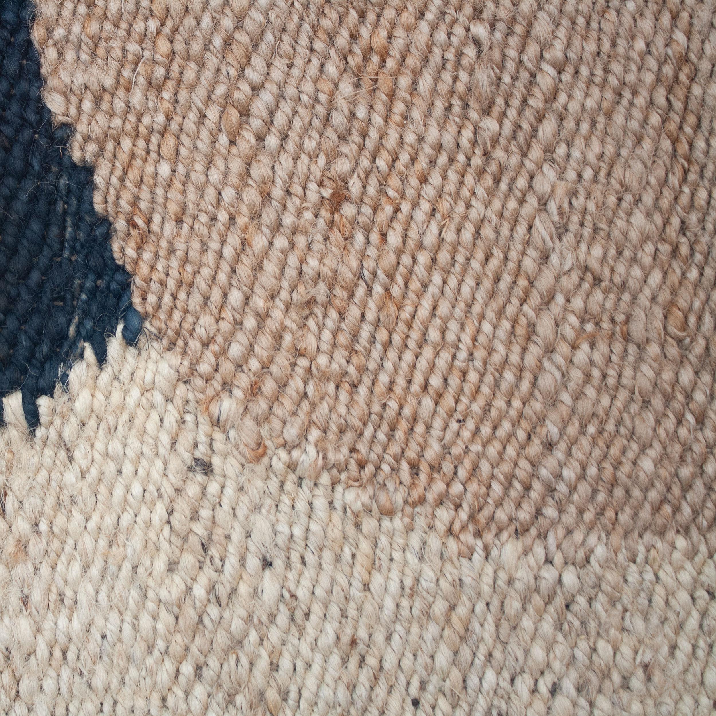 This jute rug has been ethically hand woven in the finest jute yarns by artisans in Rajasthan, India, using a traditional weaving technique which is native to this region.

The purchase of this handcrafted rug helps to support the artisans and