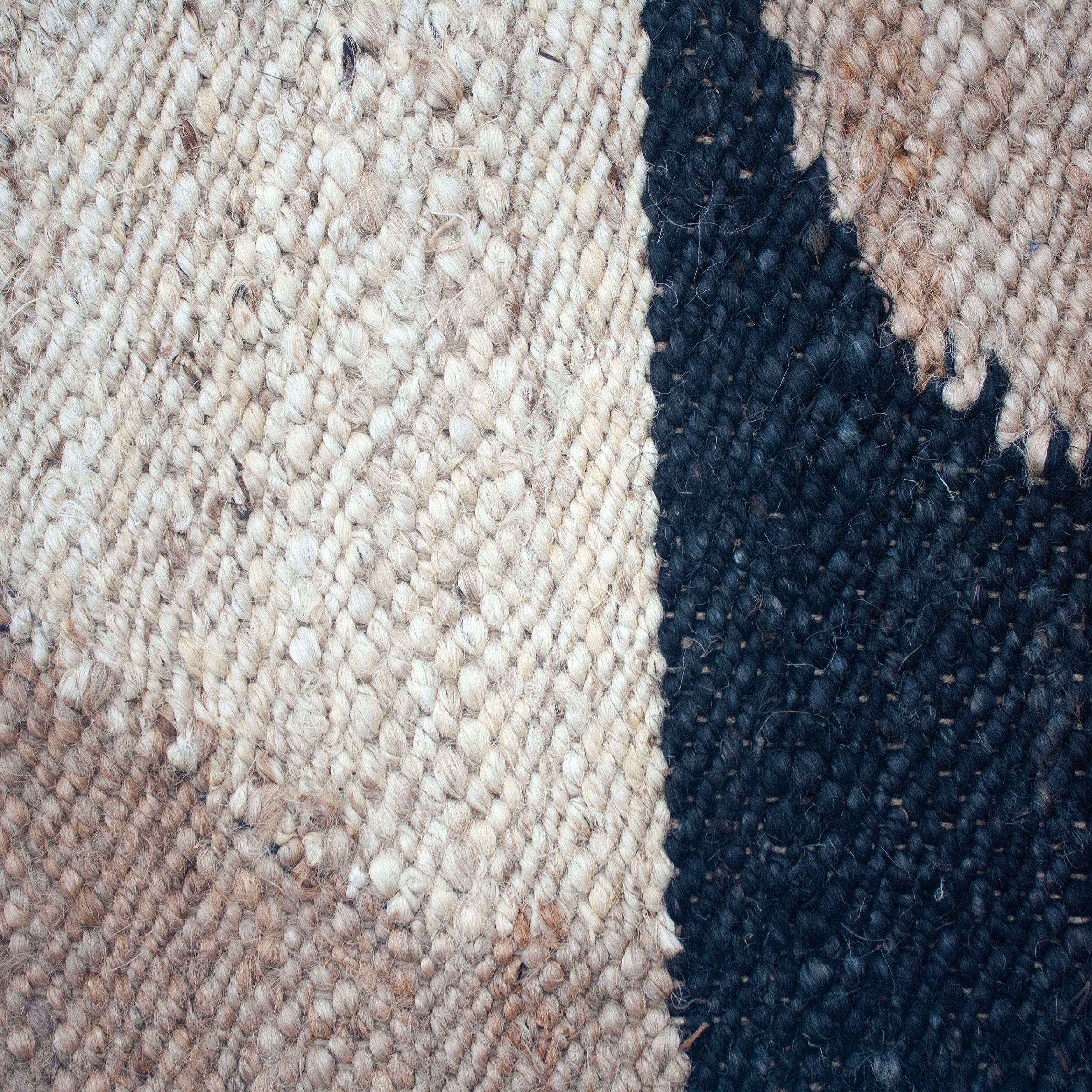 This jute rug has been ethically hand woven in the finest jute yarns by artisans in Rajasthan, India, using a traditional weaving technique which is native to this region.

The purchase of this handcrafted rug helps to support the artisans and