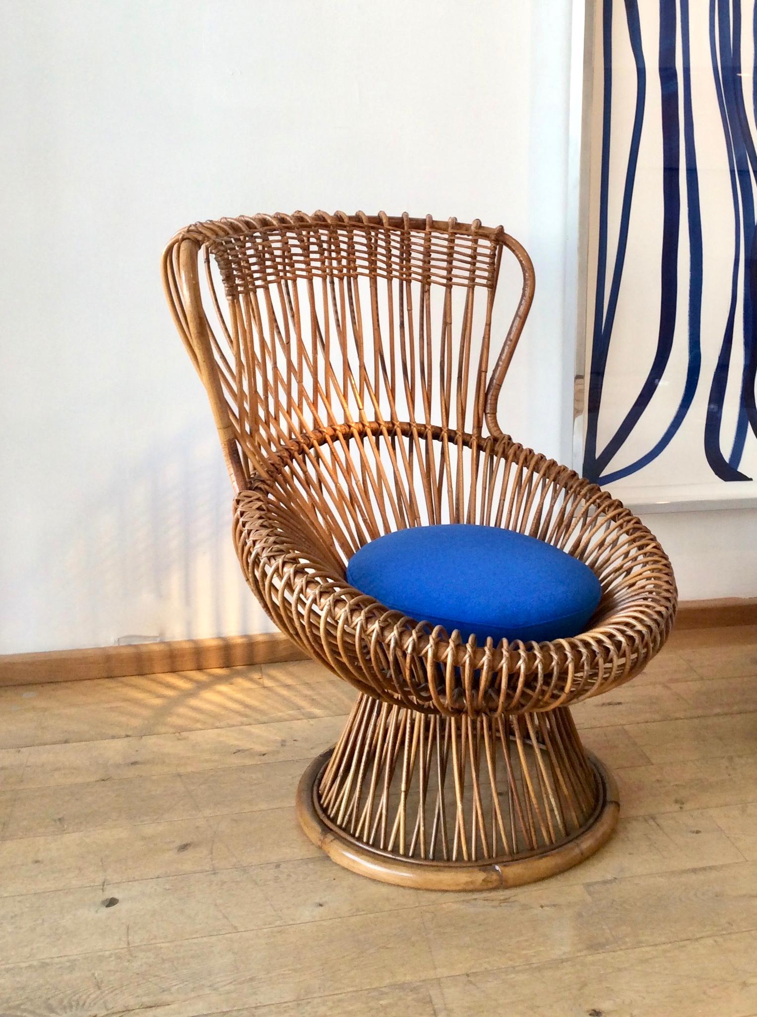 For Vittorio Bonacina, Como.
Woven bamboo and rattan, with new cushions.
Lovely, warm, deep honey patina to the rattan.
Measures: Chair H 92.5 / W 85 / D 72 cm
Footstool Height 32 / Diameter 66 cm
Illus. 'Repertorio 1950-2000', Vol. 1, p.