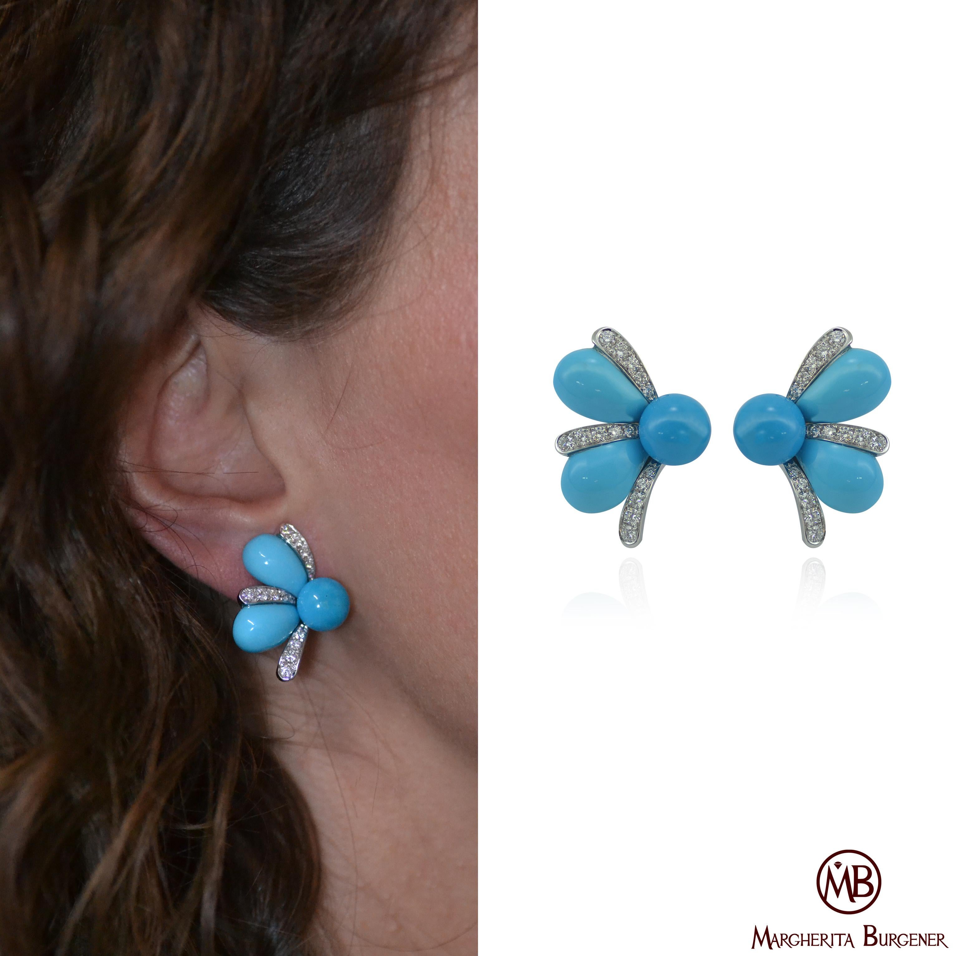 The lovely turquoise and diamonds earrings are handcrafted in Margherita Burgener family workshop, based in  Valenza, Italy

They are very comfortable, light and sparkling, combining an eye-catching design made of cabochon natural turquoise,