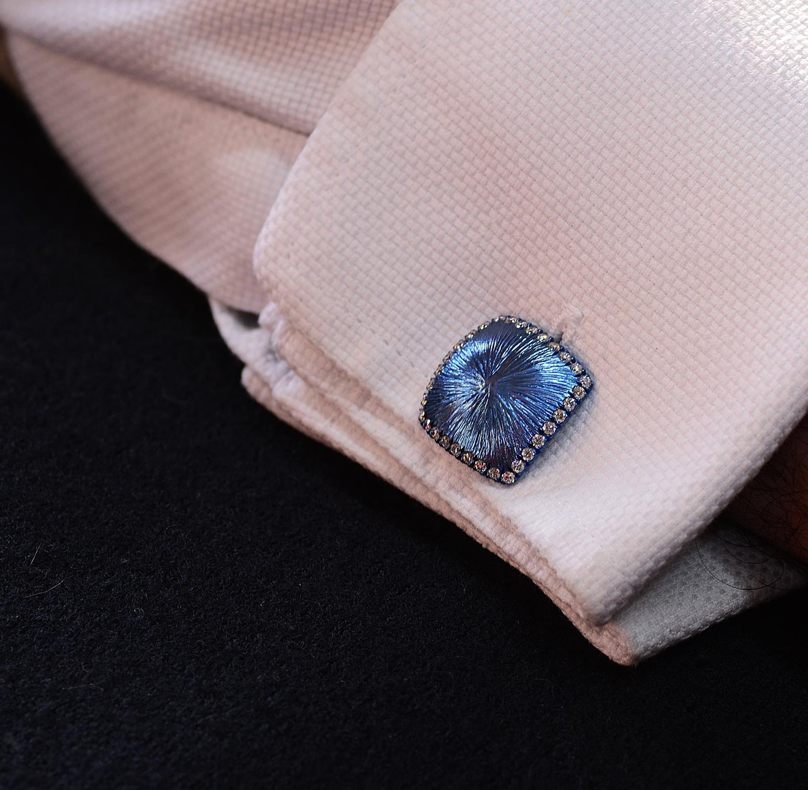 Handcrafted in Italy, the dress-set is made of  two cufflinks and 4 studs in blue titanium and white gold.
18K gold for  total grams 7.70
number 184 diamonds for total carat weight 2.24

The diamonds we use are natural diamonds and not synthetic.