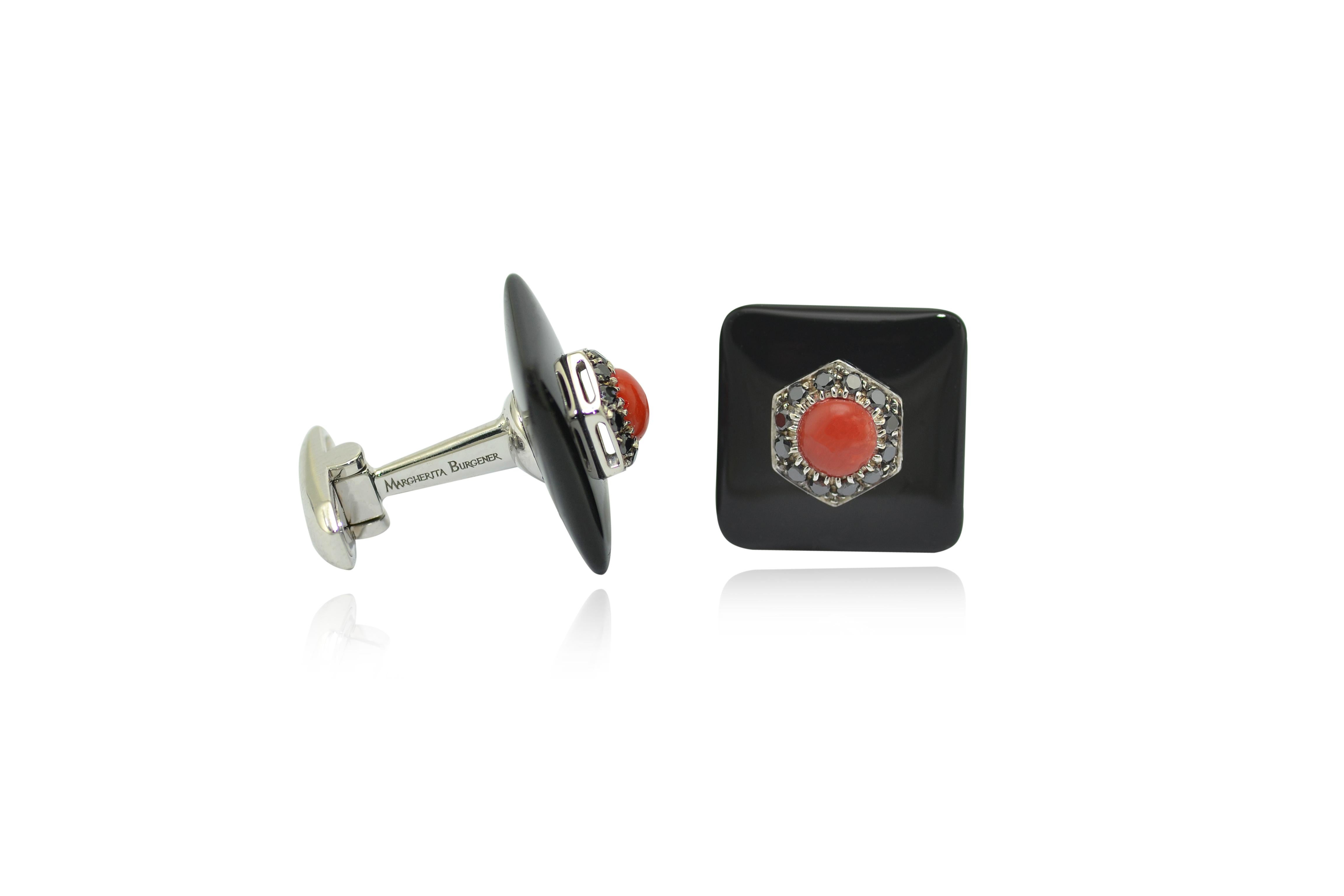 Handcrafted in Margherita Burgener factory, in Italy, the cufflinks are made in 18 Kt white gold.
the main motif is squared, bombè onyx, centering half ball of red ruburm coral surrounded by exagonal motif set in black diamonds.
Chic with that