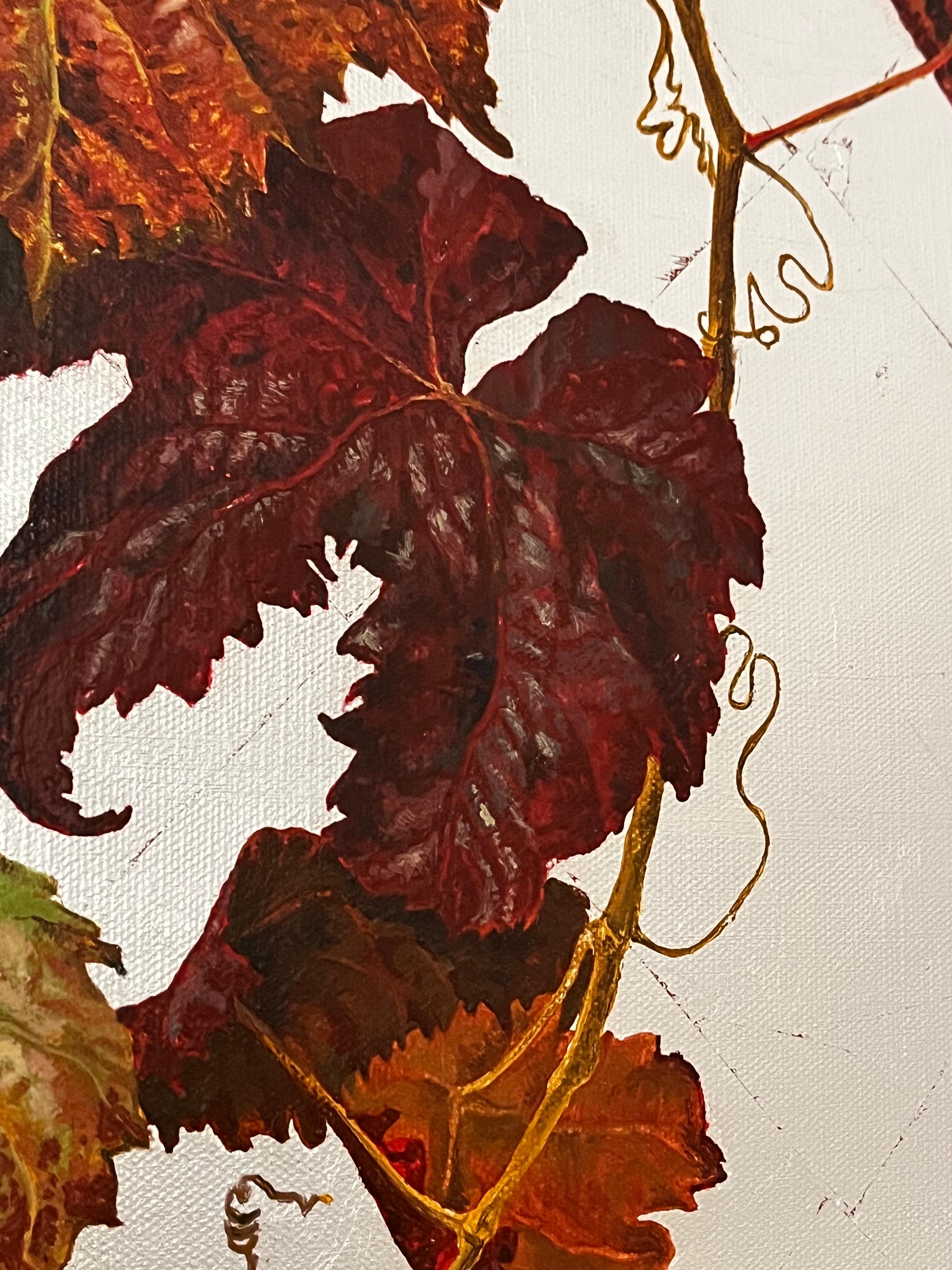 A vine shoot in warm autumn colours shows a ripe, purplish bunch against a silvery background. 

With elegance and great balance Margherita Leoni (b. 1974 Bergamo) weighs solids and voids, warm tones and cold tones, renewing the centuries-old