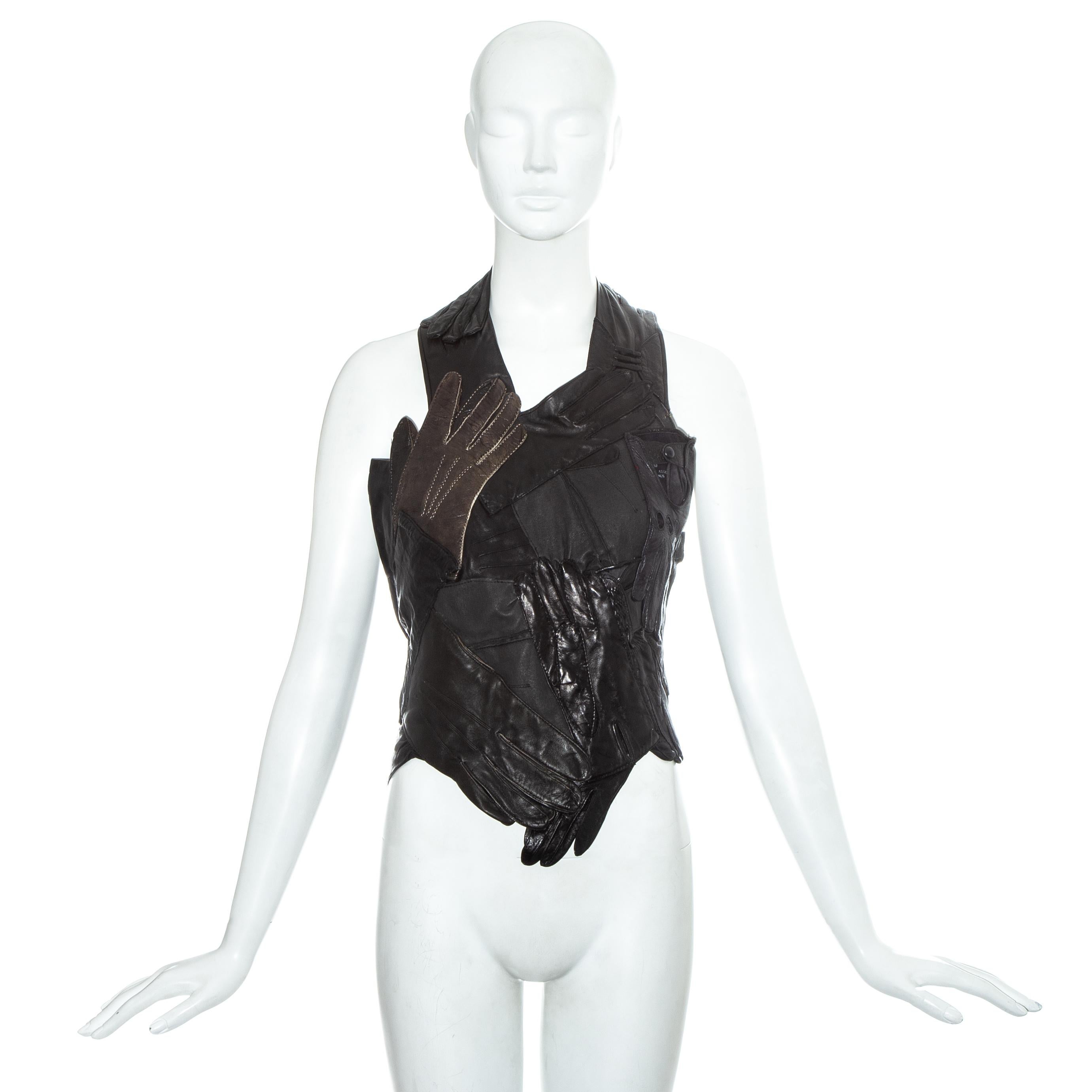 Martin Margiela, iconic artisanal glove top made from an assortment of vintage leather gloves. Halter neck, open back with snap button closures. 

Spring-Summer 2001