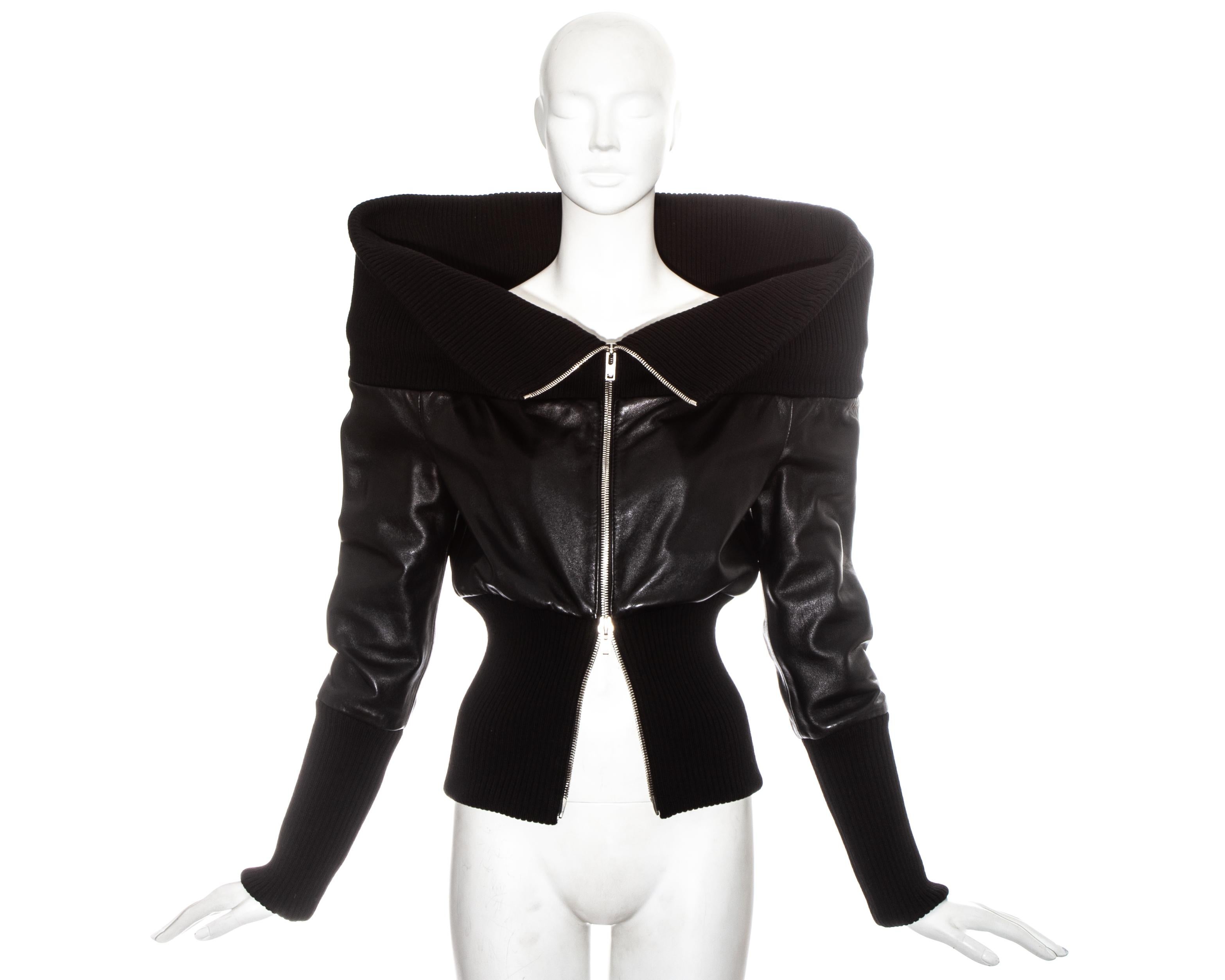 Martin Margiela black leather jacket with metal double ended zip fastening, rib knit cuffs, waist band and funnel neck collar, and built in shoulder pads.

Fall-Winter 2008