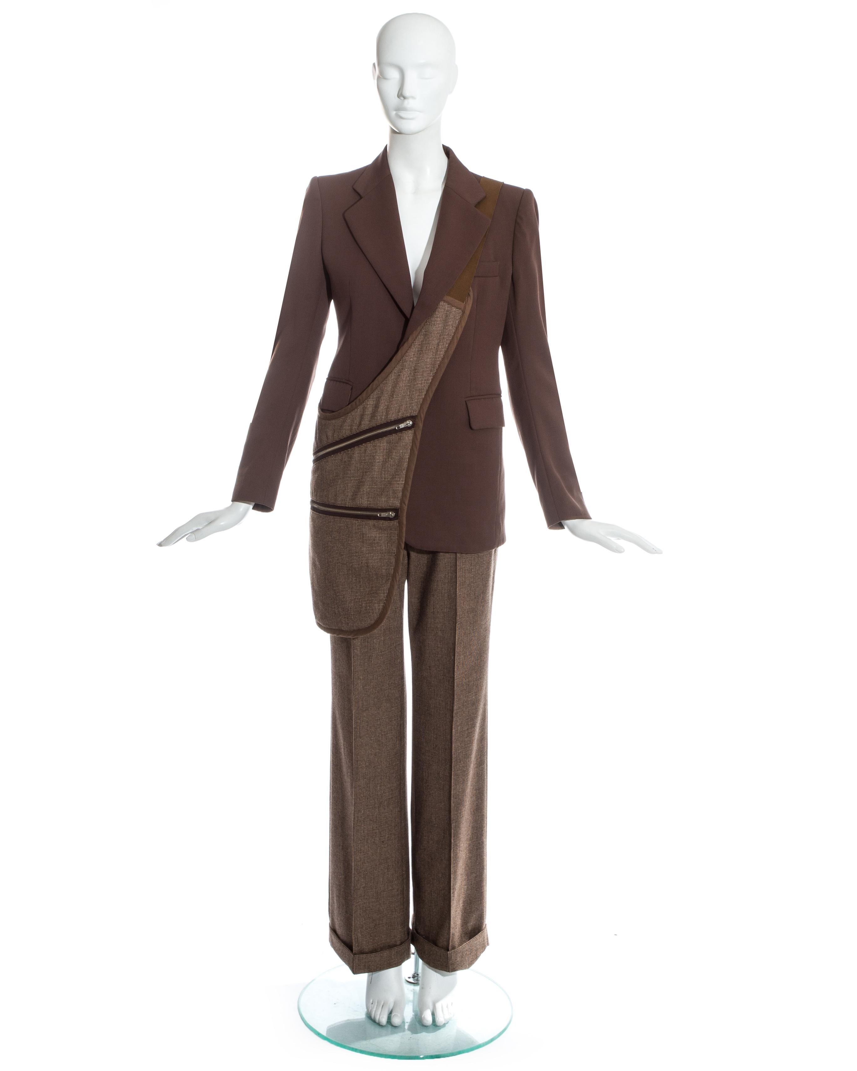 Martin Margiela; brown tweed wool pant suit with matching saddle bag. 

Fall-Winter 1998
