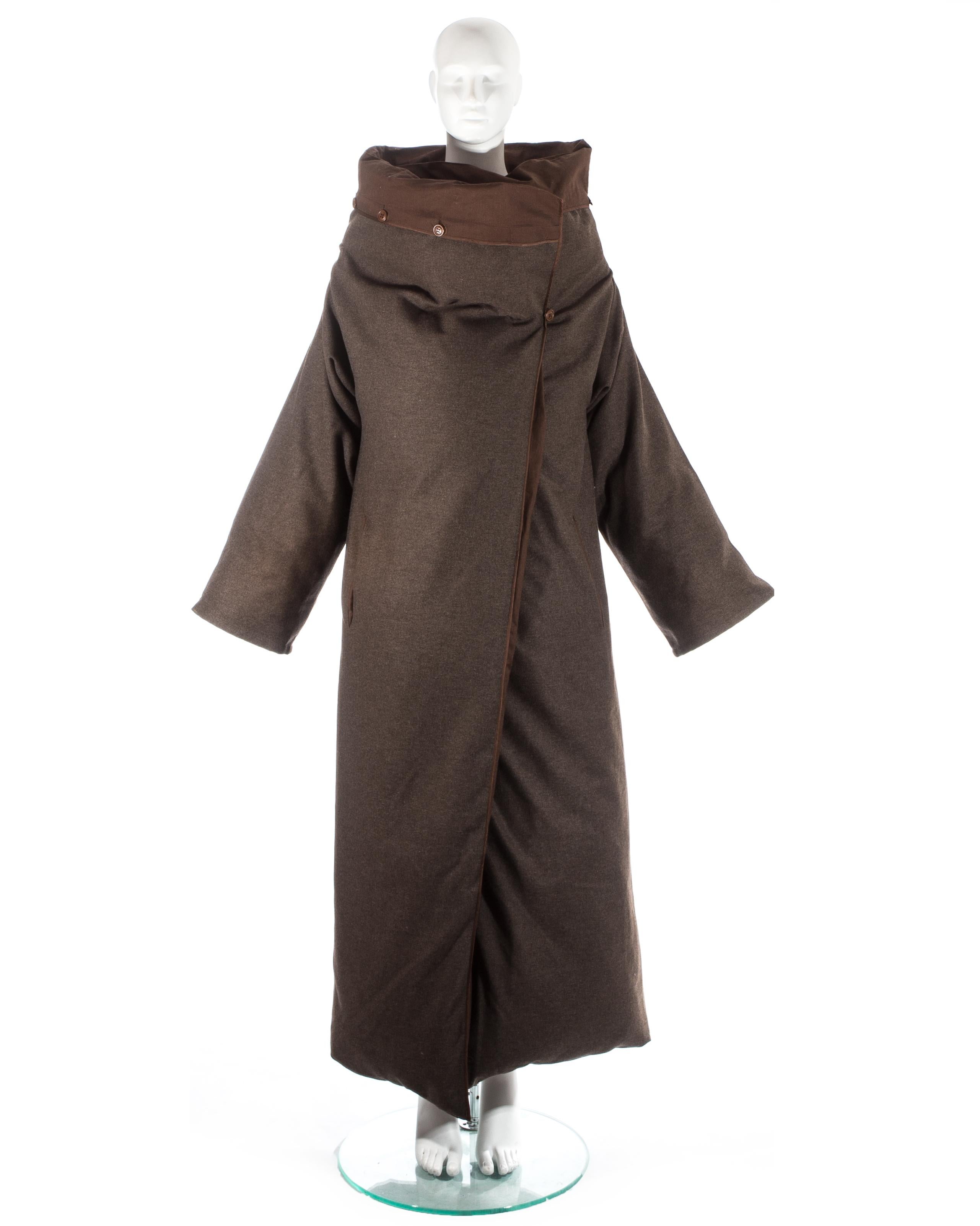 Martin Margiela; 'Duvet' coat made from a Featherlite 100% down filled duvet. Sleeves can be detached with zip closures around arm holes, 2 front pockets and sold with an additional brown wool duvet cover.

Fall-Winter 1999