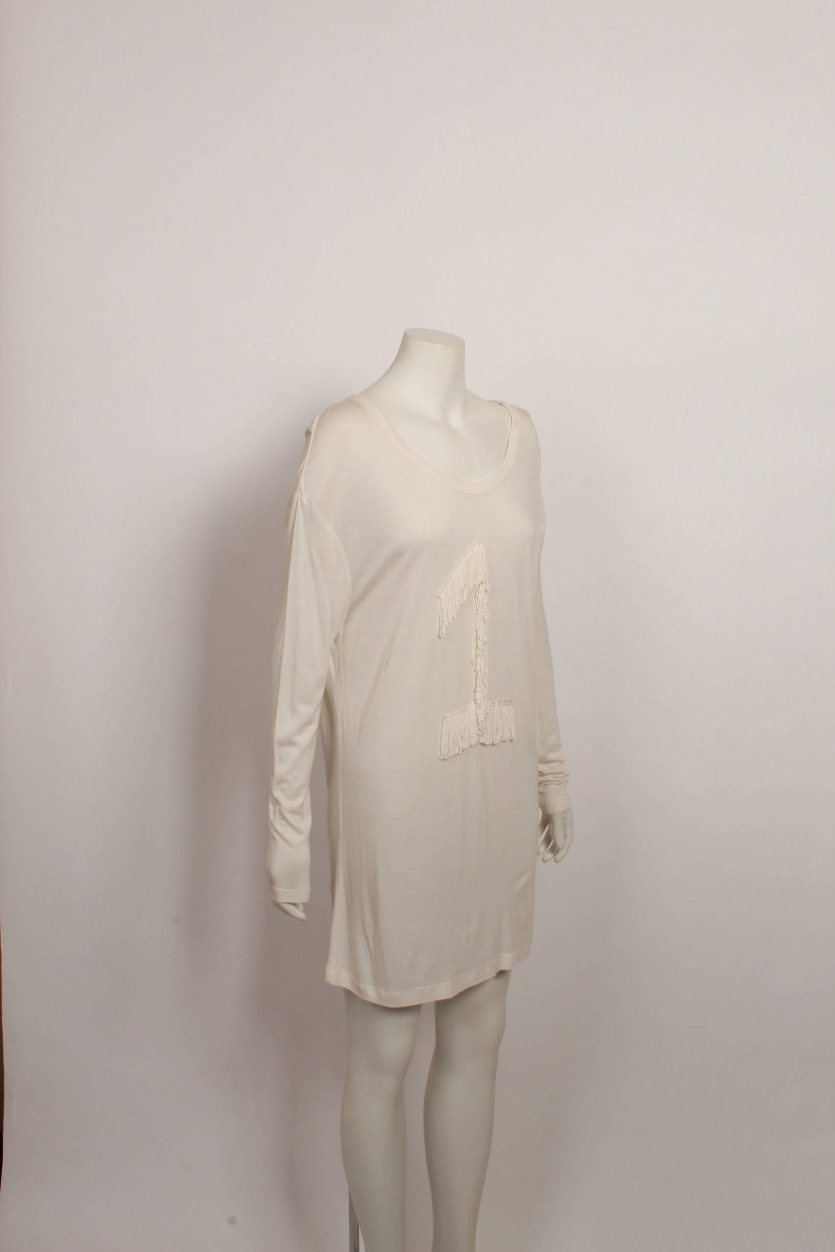 LINE # 4:
Garde-robe pour femme. A wardrobe for women.  Essentially women’s wardrobe basics, though explained as “a personal approach to dress, fixed on taste rather than on a seasonal approach to design, or a particular age group.”  
[Oct. 2003 for