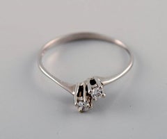 Margit E. Collection, Denmark. Alliance Ring in 9 Carat White Gold Zirconias