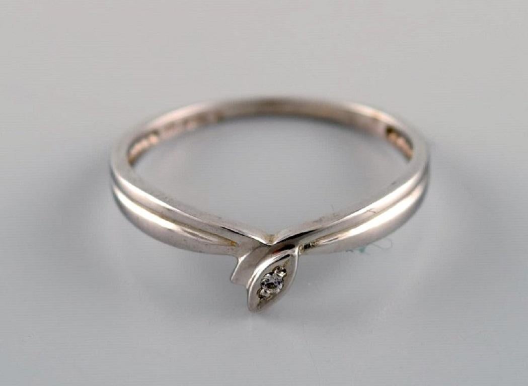 Margit E. Collection, Denmark. Alliance ring in 9 carat white gold adorned with cubic zirconias. 21st Century.
Diameter: 17.75 mm.
US size: 7.5.
In excellent condition.
Stamped.
In most cases, we can change the size for a fee (USD 50) per ring.