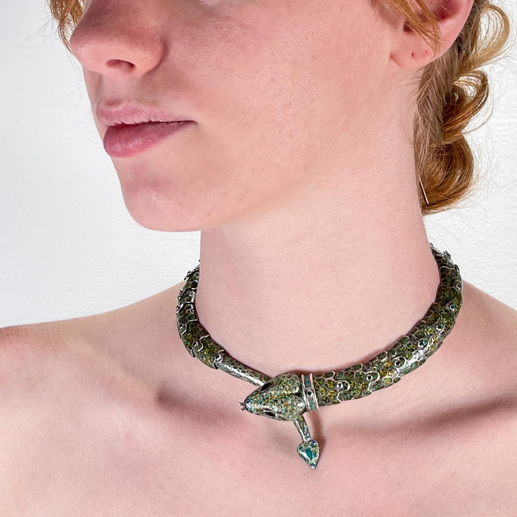 A very fine Mexican sterling silver & enamel necklace.

In the form of a green-scaled snake or serpent. 

By Margot de Taxco (Margo Vaughn Voorhies Carr).

Pattern no. 5554

These colliers are one of the most coveted forms by Margot.

Simply a