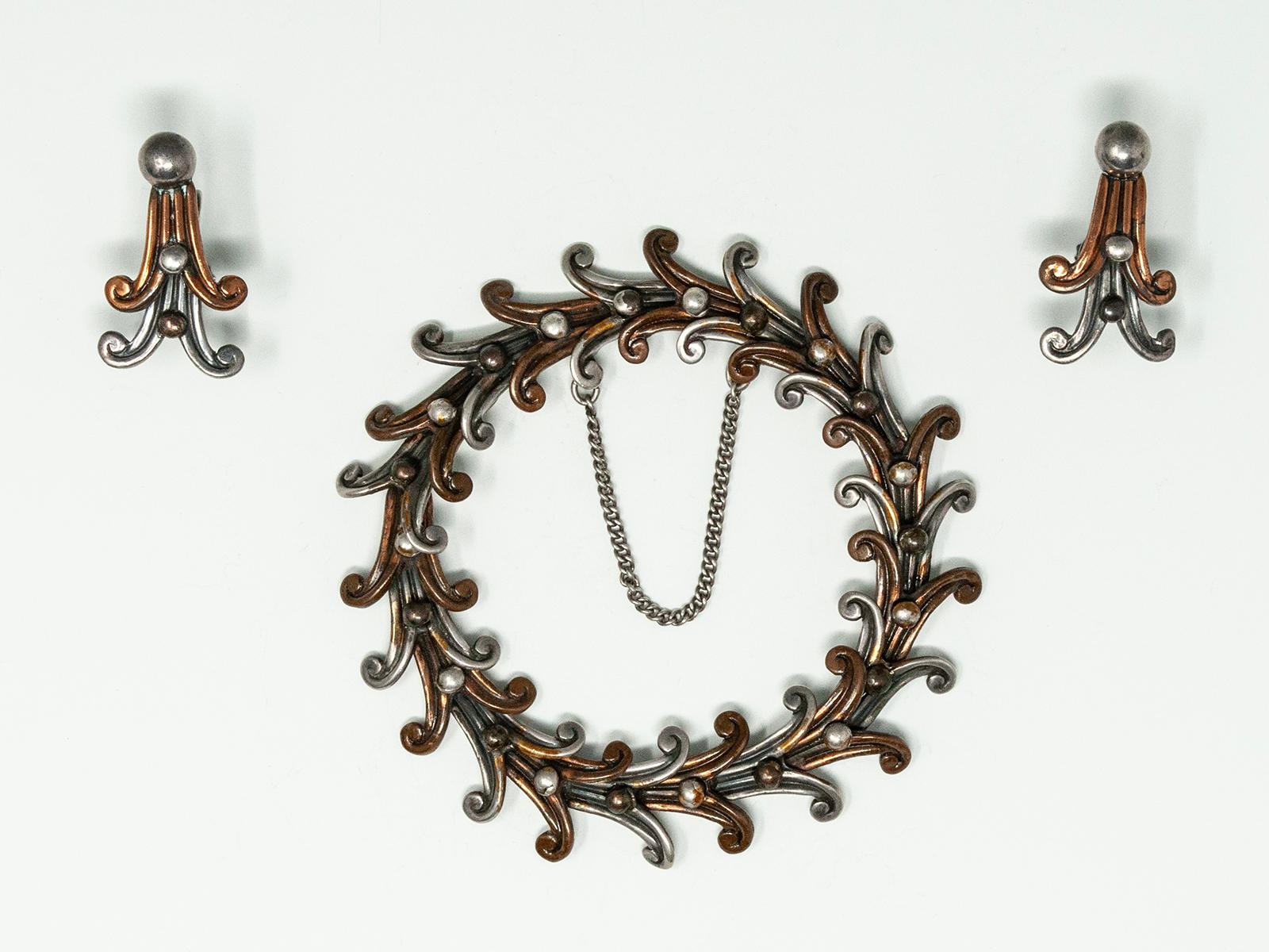 Margot de Taxco sterling silver bracelet and earring set. The bracelet has a hook and eye closure with a safety chain, the earrings are screw back. Marked with Margot de Taxco made in Mexico, numbered: 5102.

Margot van Voorhies moved to Mexico in