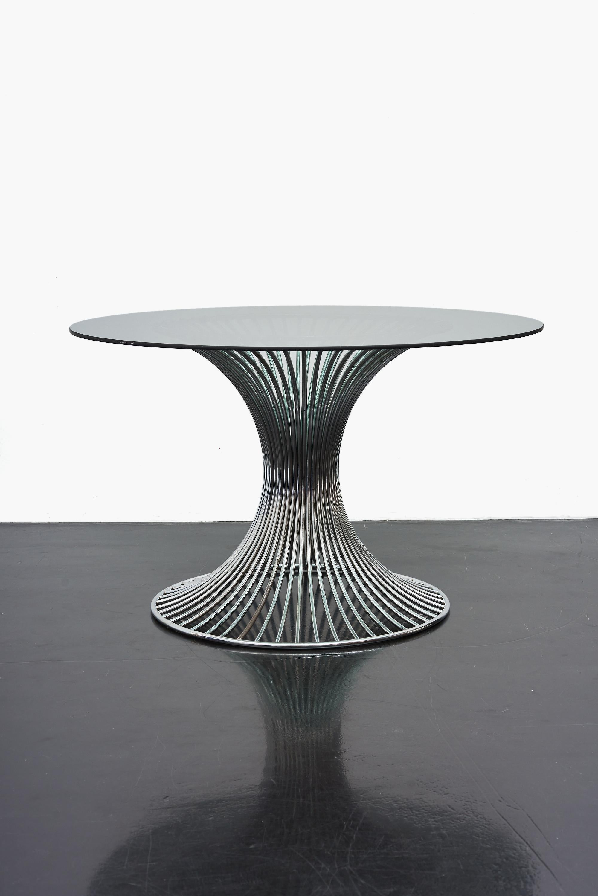 A sculptural dining table designed in the 1960s  by Gastone Rinaldi for the Italian furniture brand Rima.
Beautifully designed, an eye-catcher (dining chairs not included)