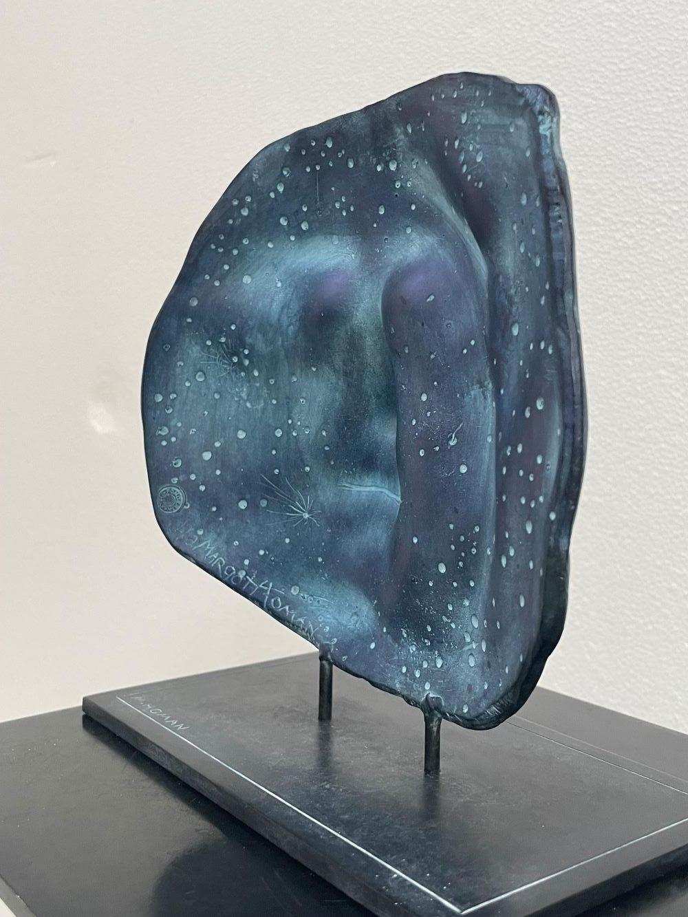 Both Sides of the Moon Bronze Sculpture Two Faces Portrait Blue In Stock 
The sculptures of Margot Homan (1956, Oss) show a perfect command of the old craft of modelling and sculpting, with which she continually develops an age old tradition. In her