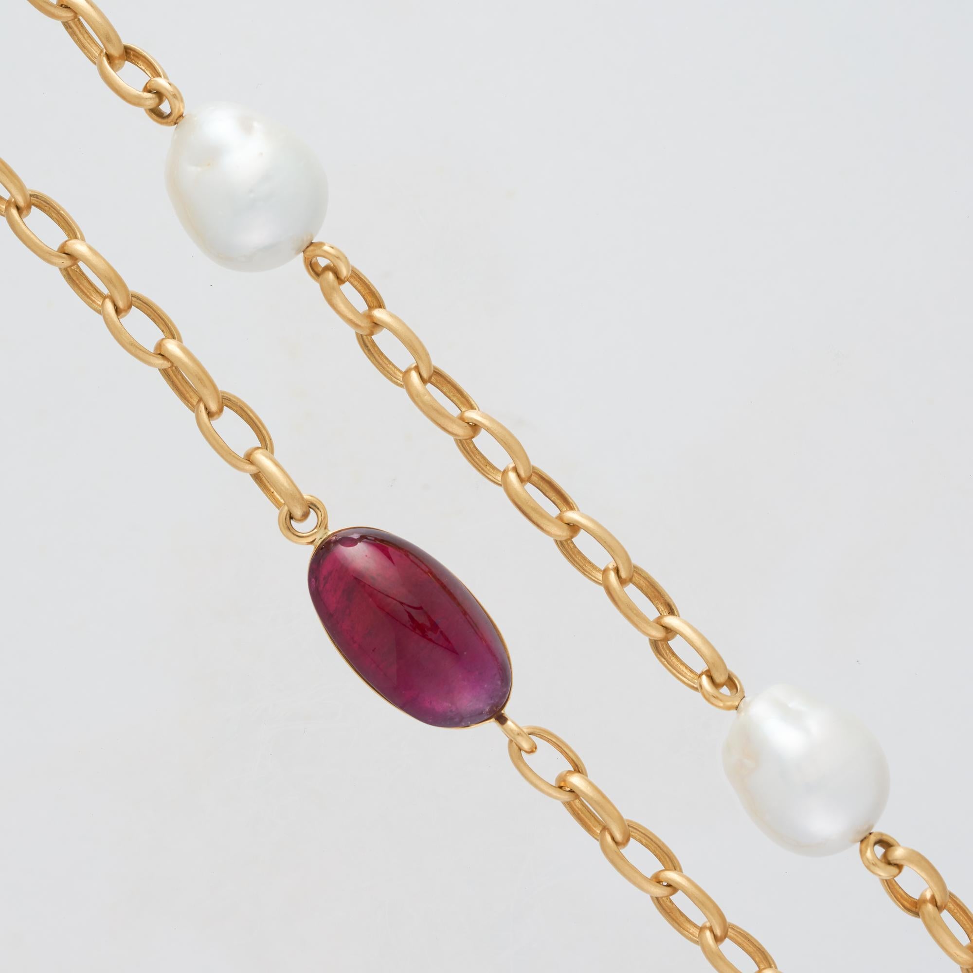 Margot McKinney 18 karat Yellow Gold South Sea Pearl and Amethyst Necklet featuring 6  Baroque South Sea Pearls 15mm+, 2 Amethyst  Pebbles average weight 43.44 carats and 2 Diamond Pebbles set with White Diamonds average weight 6.78 carats.
