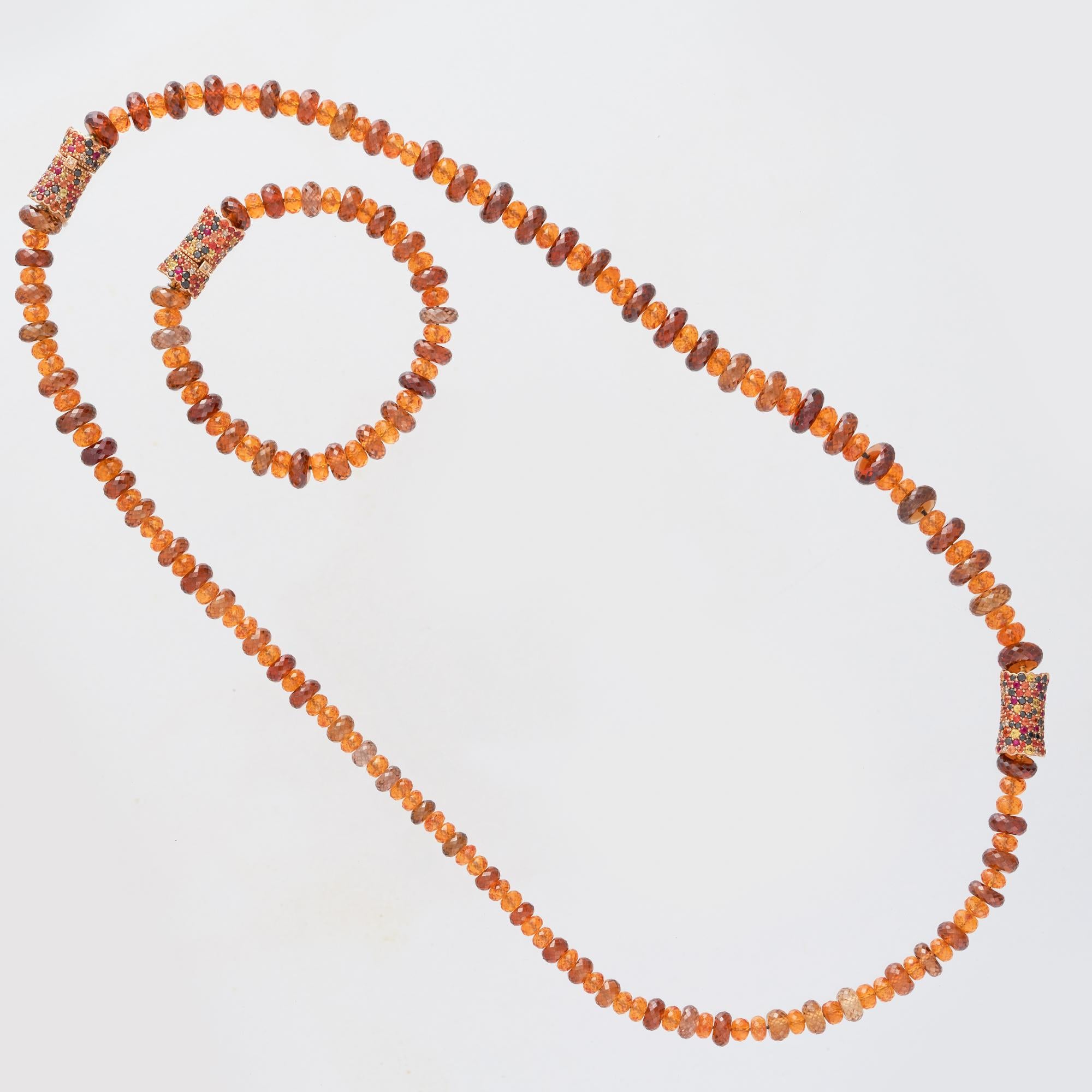 Margot McKinney 18 karat Rose Gold Garnet and Zircon bead Necklace features three gem set Rondelles, two of which are clasp set to form a detachable bracelet. The necklace is set with 101 Garnet beads 165.00 carat, 85 Zircon beads 370.00 carat, 131
