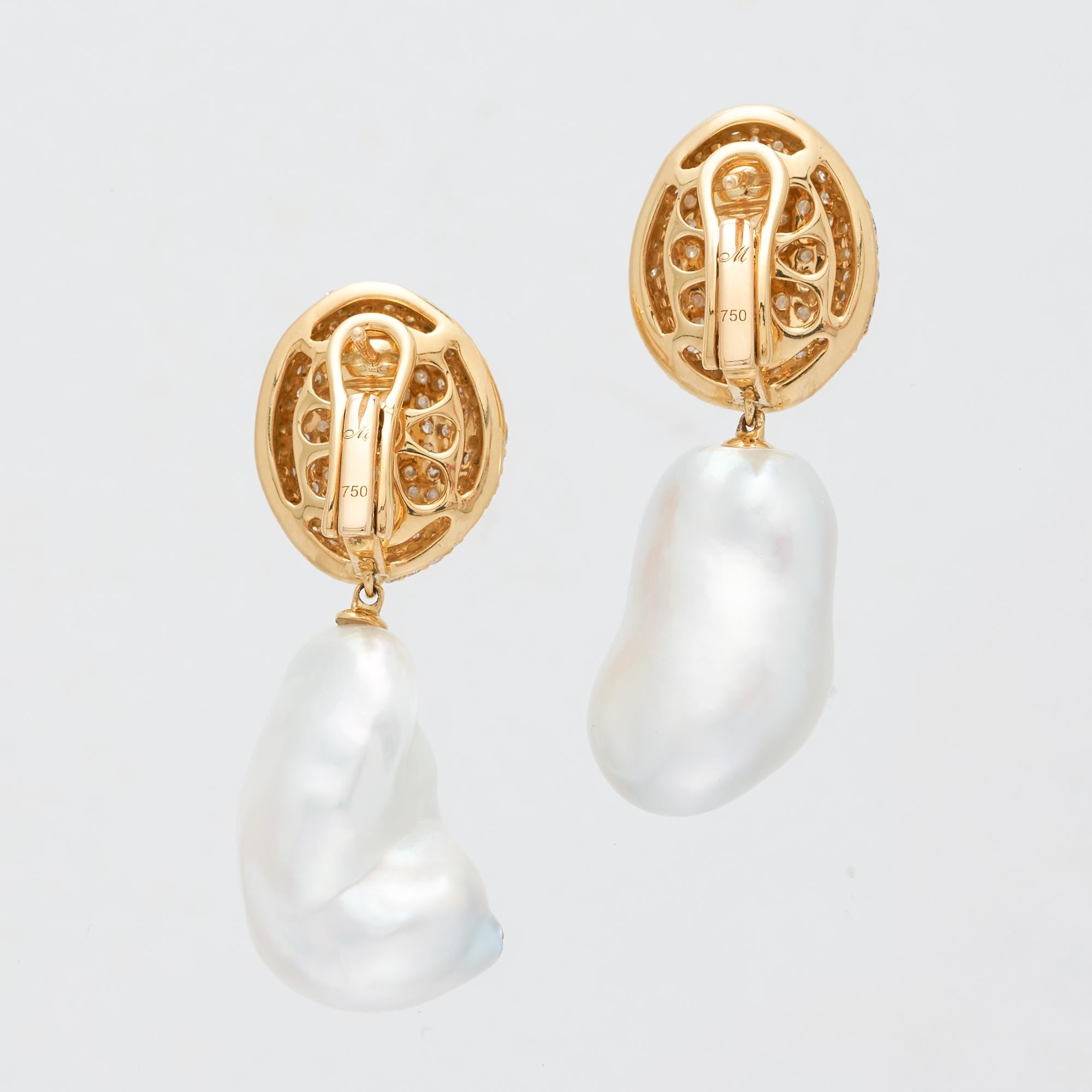 Margot McKinney 18 karat Yellow Gold South Sea Pearl & White Diamond Drop Earrings featuring a pair of baroque South Sea pearls 14-16mm and an average 2.7 carat of diamonds.
