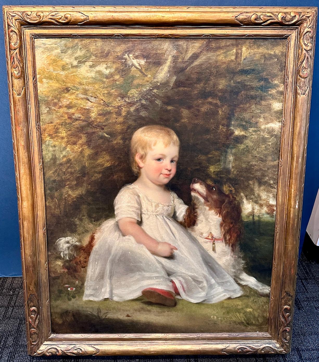 19th century English portrait of a young girl with her pet spaniel in  landscape - Painting by Margret Carpenter