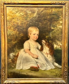 19th century English portrait of a young girl with her pet spaniel in  landscape