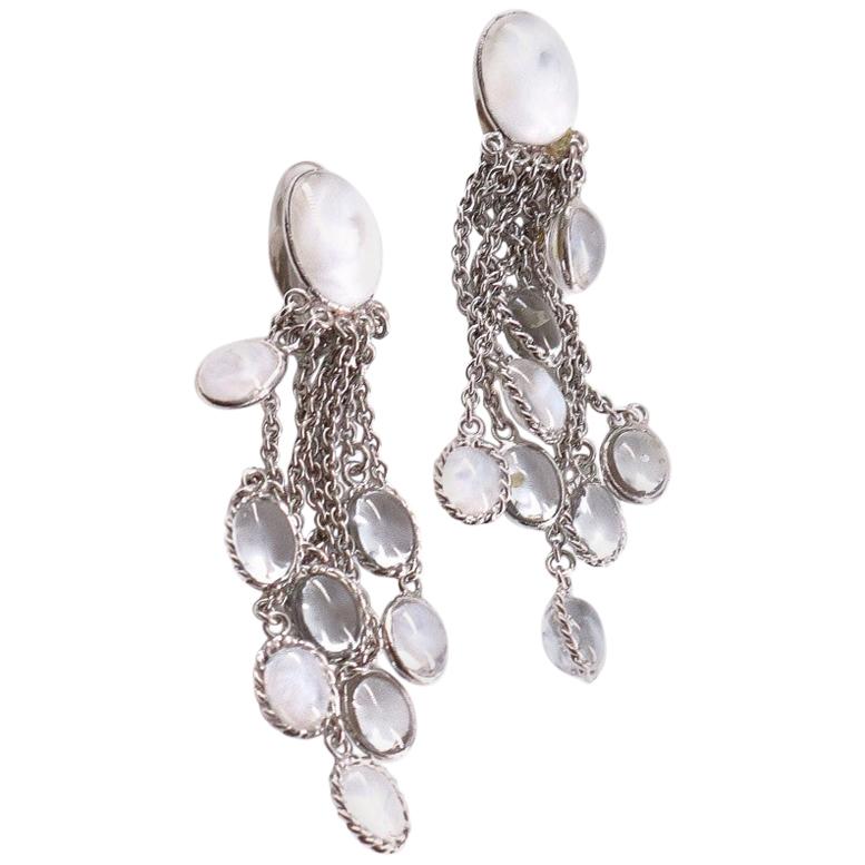 MARGUERITE DE VALOIS Dangling Clip-on Earrings in White Molten Glass