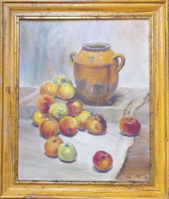 Provenzalische Tischdekoration. Honig glasierter Confiturier und Äpfel.