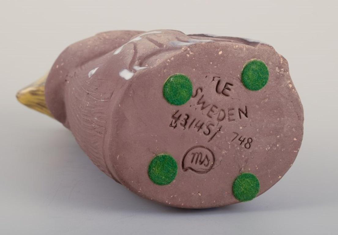 Mari Simmulson for Upsala Ekeby. Ceramic figurine of a girl with two cats For Sale 1
