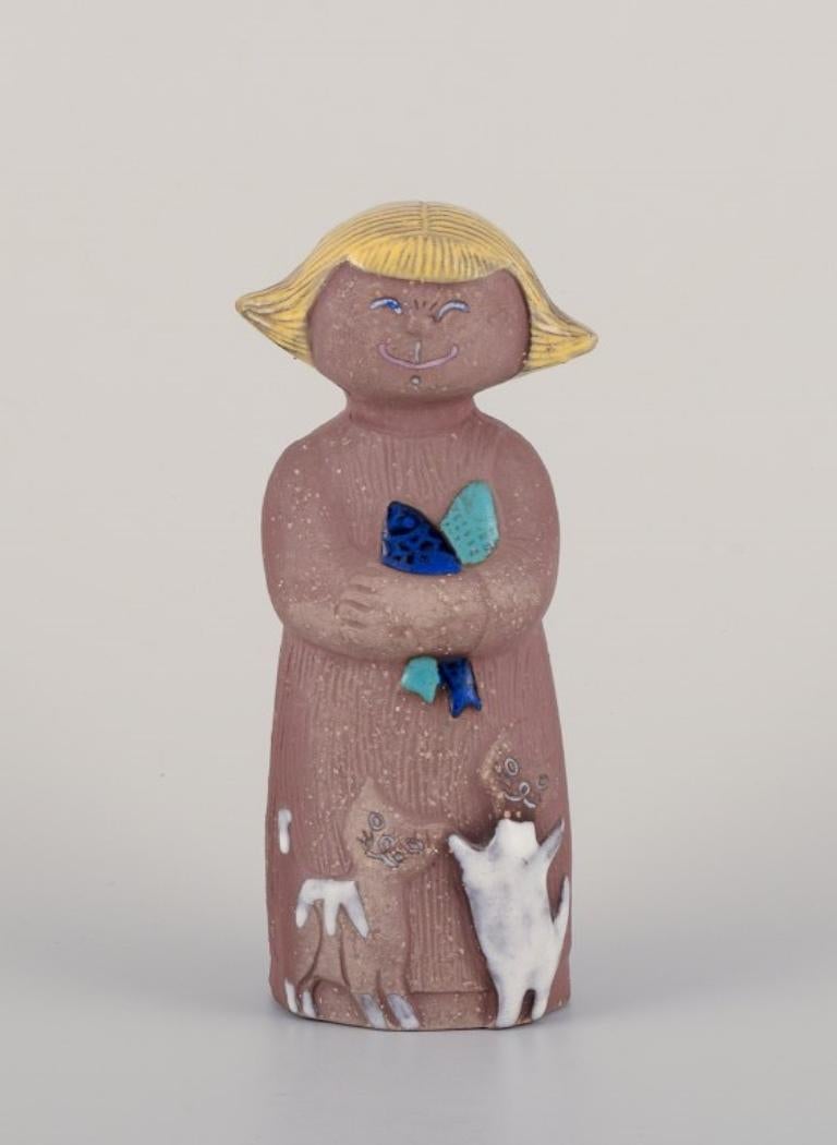 Mari Simmulson for Upsala Ekeby. Ceramic figurine of a girl with two cats For Sale
