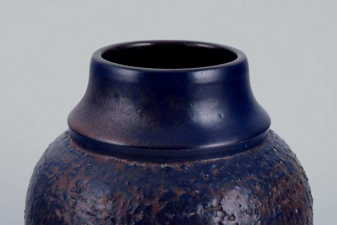 Swedish Mari Simmulson for Upsala Ekeby. Ceramic vase with glaze in blue and brown. For Sale