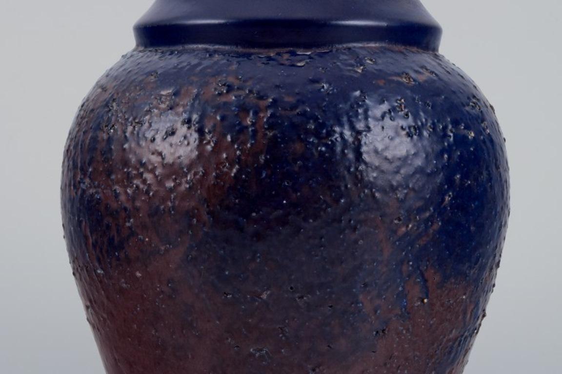 Glazed Mari Simmulson for Upsala Ekeby. Ceramic vase with glaze in blue and brown. For Sale