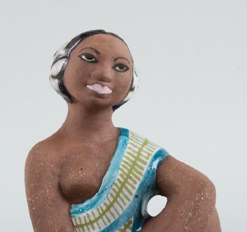 Scandinavian Modern Mari Simmulson for Upsala-Ekeby. Rare ceramic figure of a Tahitian woman.  For Sale