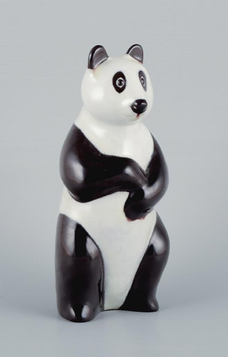 Mari Simmulson for Upsala Ekeby.
Rare hand-painted ceramic panda figure.
Model number 4224.
1960/70s.
Marked.
Dimensions: H 21.0 x D 9.5 cm.