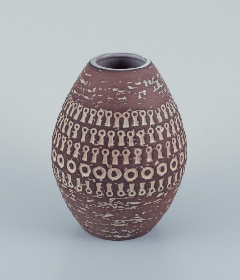 Mari Simmulson (1911-2000) for Upsala Ekeby, Sweden. 
Ceramic vase in modernist style.
Approximately 1960.
Marked.
In perfect condition.
Dimensions: Height 15.5 cm x Diameter 11.5 cm.

Mari Simmulson is recognized as a prominent figure in the