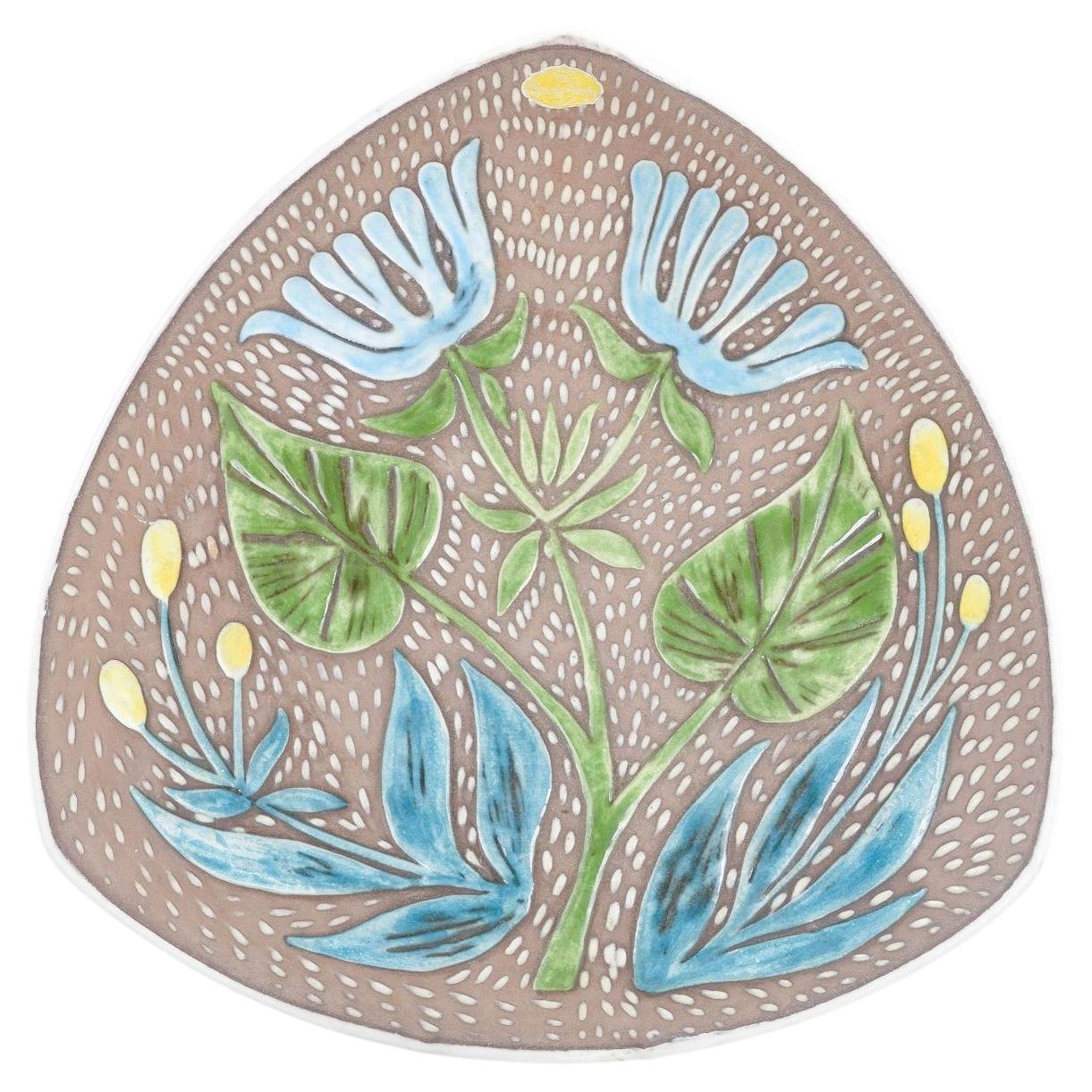 Mari Simmulson for Upsala Ekeby. Triangular ceramic dish with botanical motif.