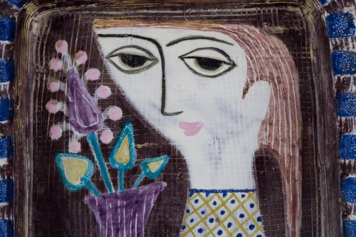 Glazed Mari Simmulson, Upsala Ekeby. Ceramic bowl. Motif of woman's face and flower.