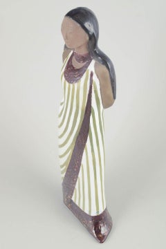 Mari Simmulson, Upsala Ekeby. Ceramic figurine of woman in a long dress. 1960s