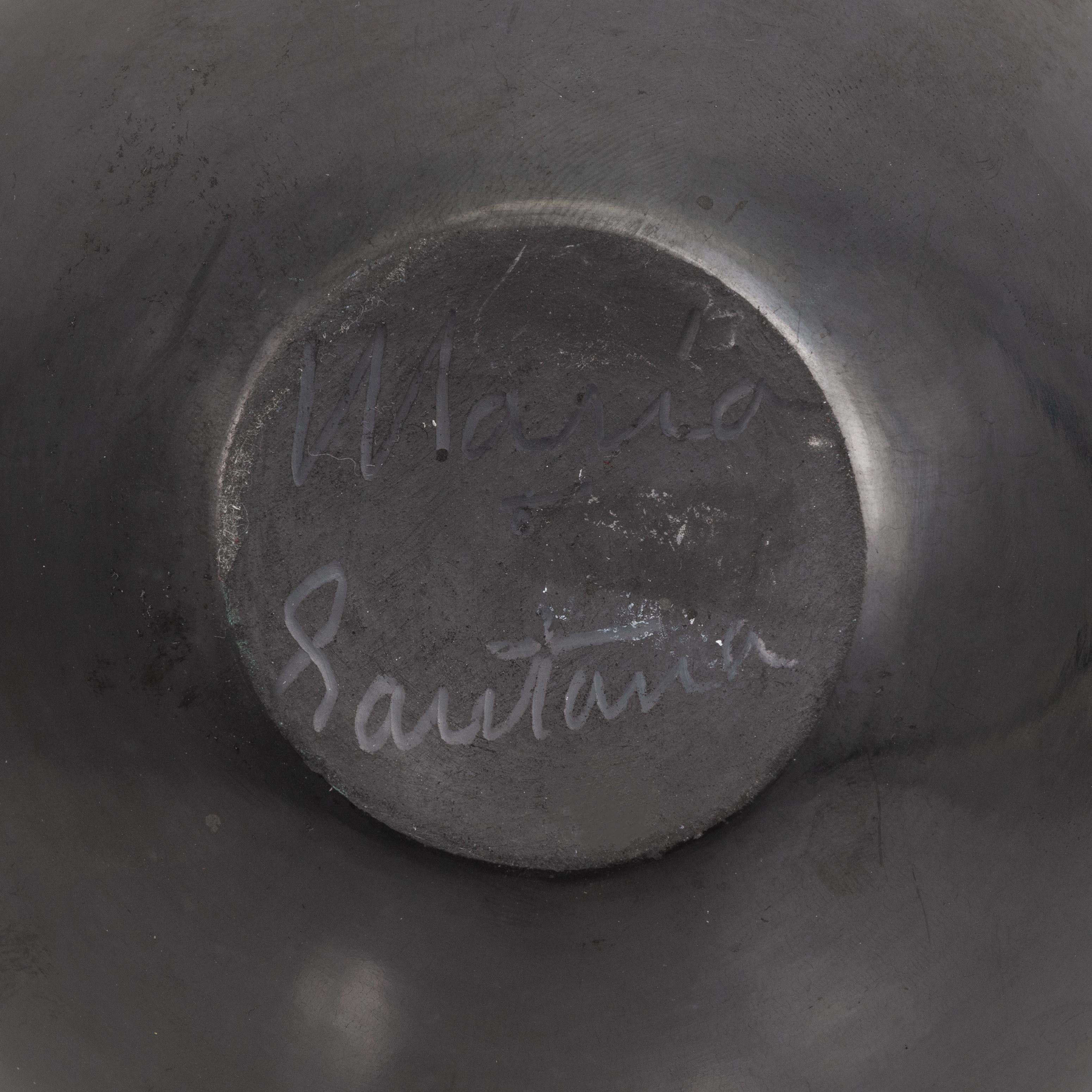 Maria and Santana Martinez Black Ware bowl. Geometric black on black pottery bowl by Maria Martinez, signed Maria and Santana. 1943 - 1956; 3 3/4