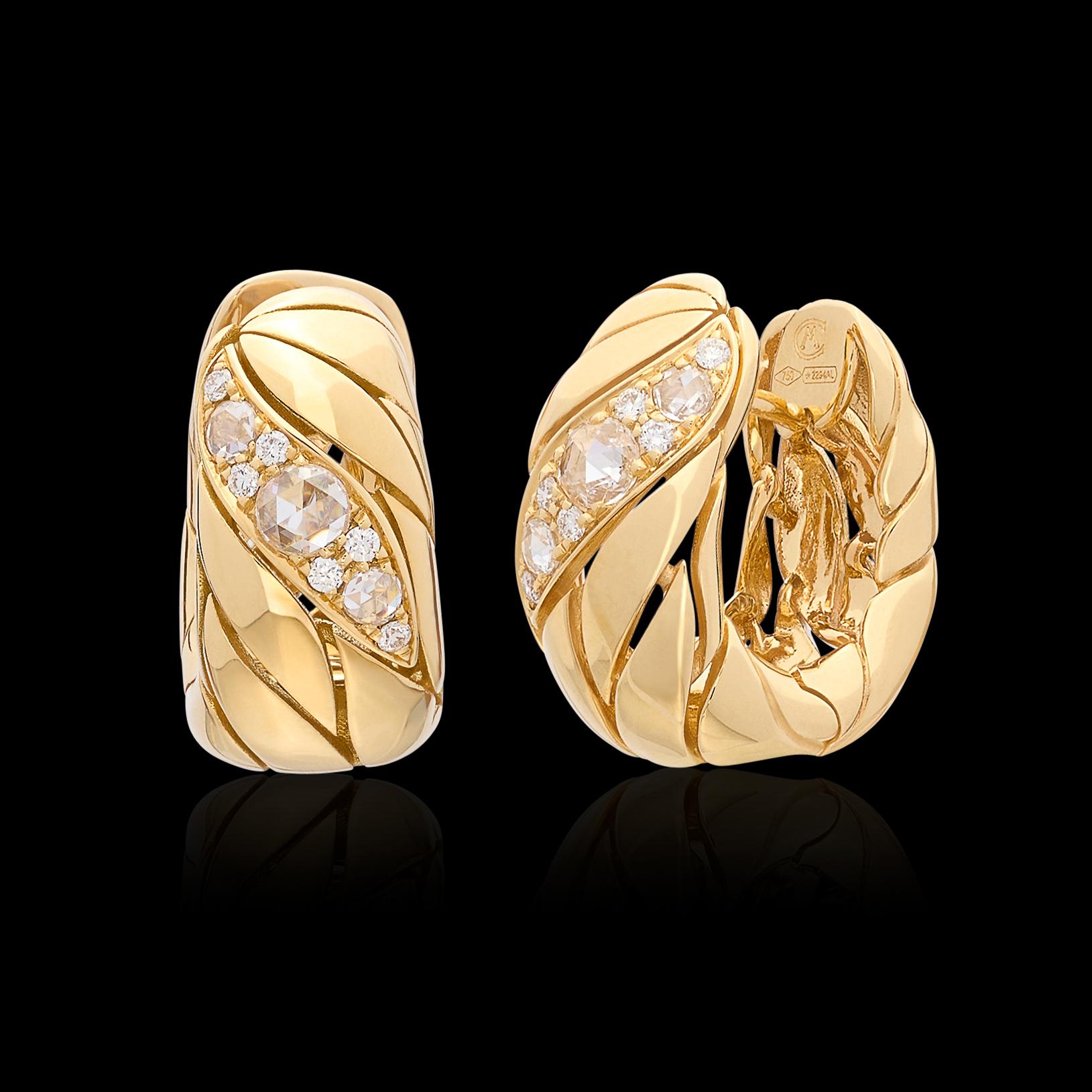 Meet your new favorite pair of everyday earrings! These Maria Canale Petal 18k gold huggie hoops are set with both rose-cut and round brilliant-cut diamonds, featuring 18 diamonds with a total weight of 0.48 carats. They weigh 13.4 grams and measure