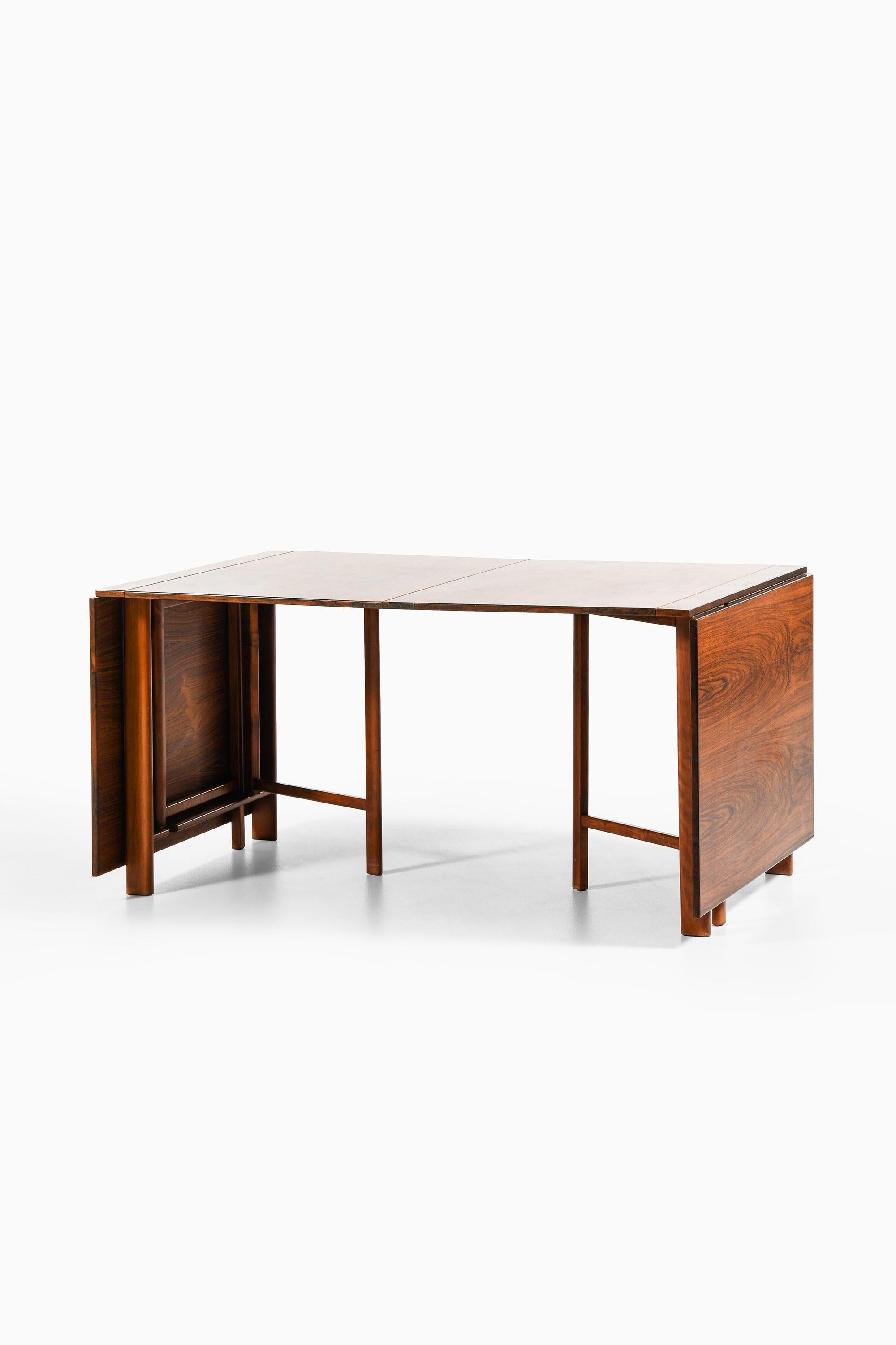 Scandinave moderne Table de salle à manger Maria à rabat en bois de rose, hêtre et laiton par Bruno Mathsson, années 1950 en vente