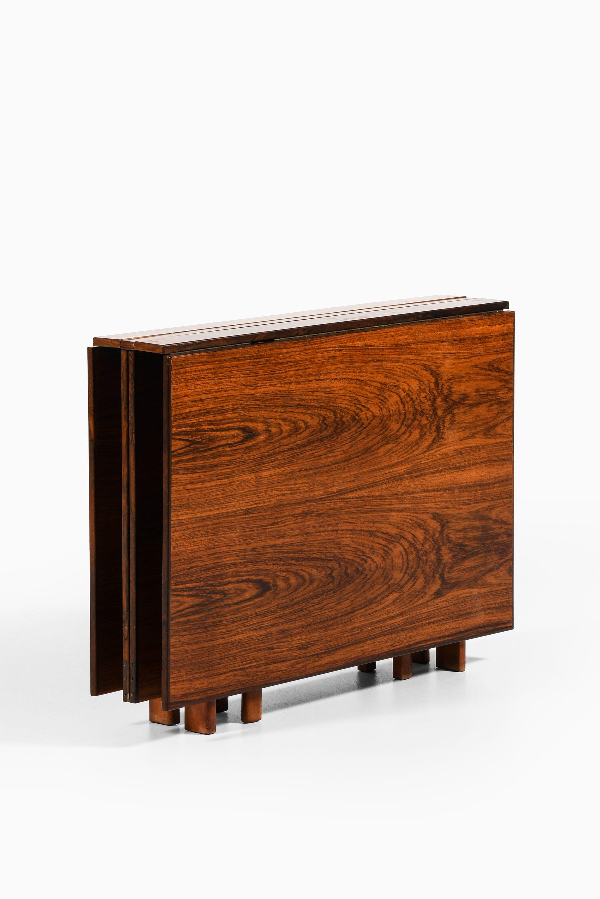 Suédois Table de salle à manger Maria à rabat en bois de rose, hêtre et laiton par Bruno Mathsson, années 1950 en vente